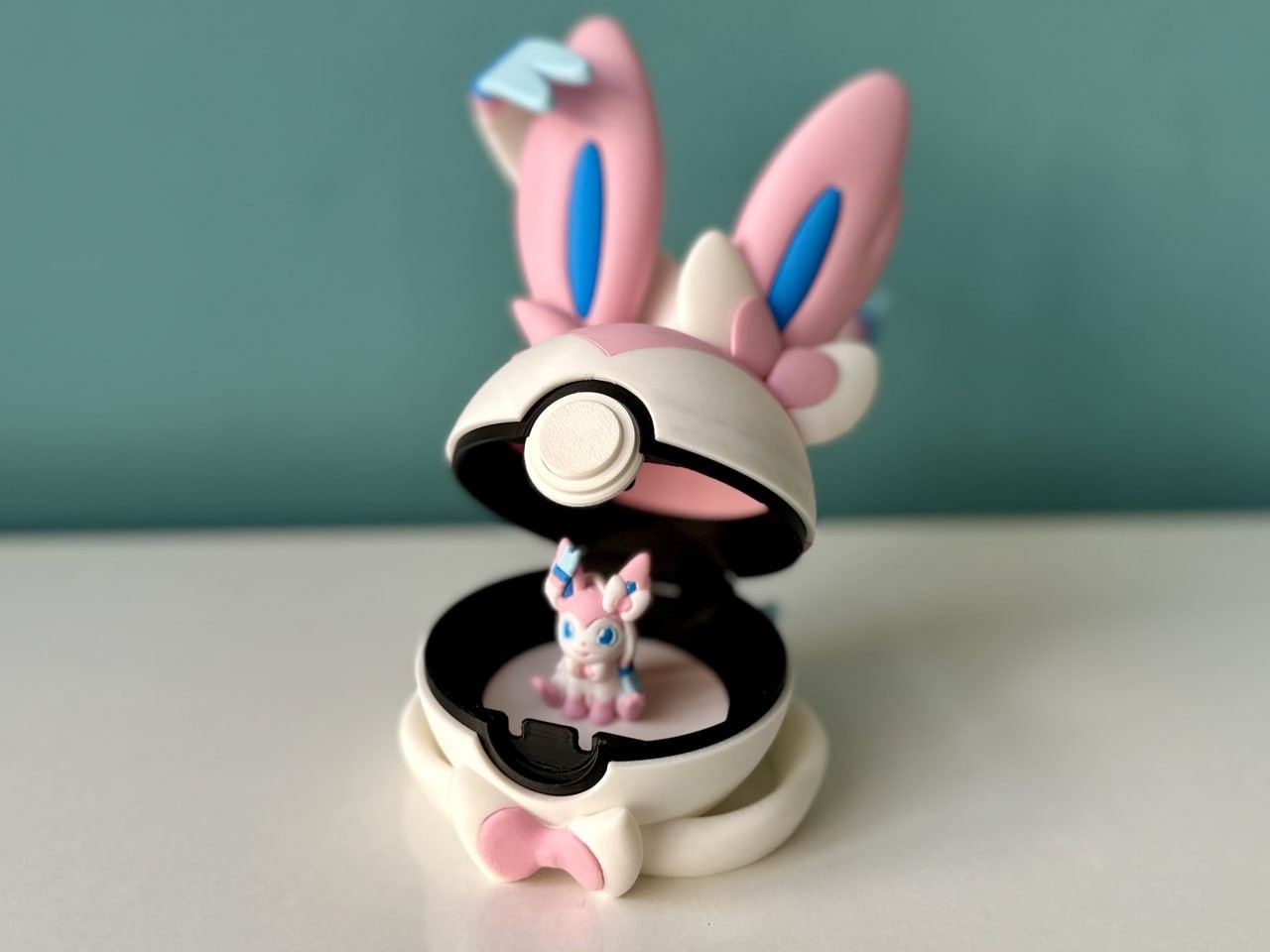Sylveon Pokeball with Mini Chibi Sylveon - Eeveelutions Sylveon Pokeball with Mini Chibi Sylveon - Eeveelutions