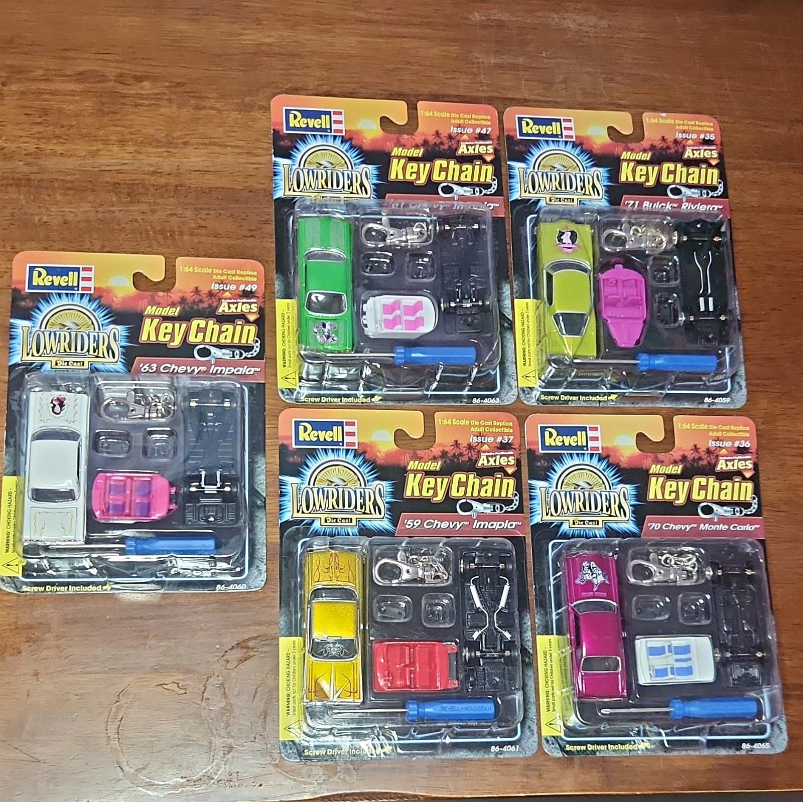 Revell Lowriders 1:64 Diecast Keychain Lot (5) Impala Monte Carlo Riviera Revell Lowriders 1:64 Diecast Keychain Lot (5) Impala Monte Carlo Riviera