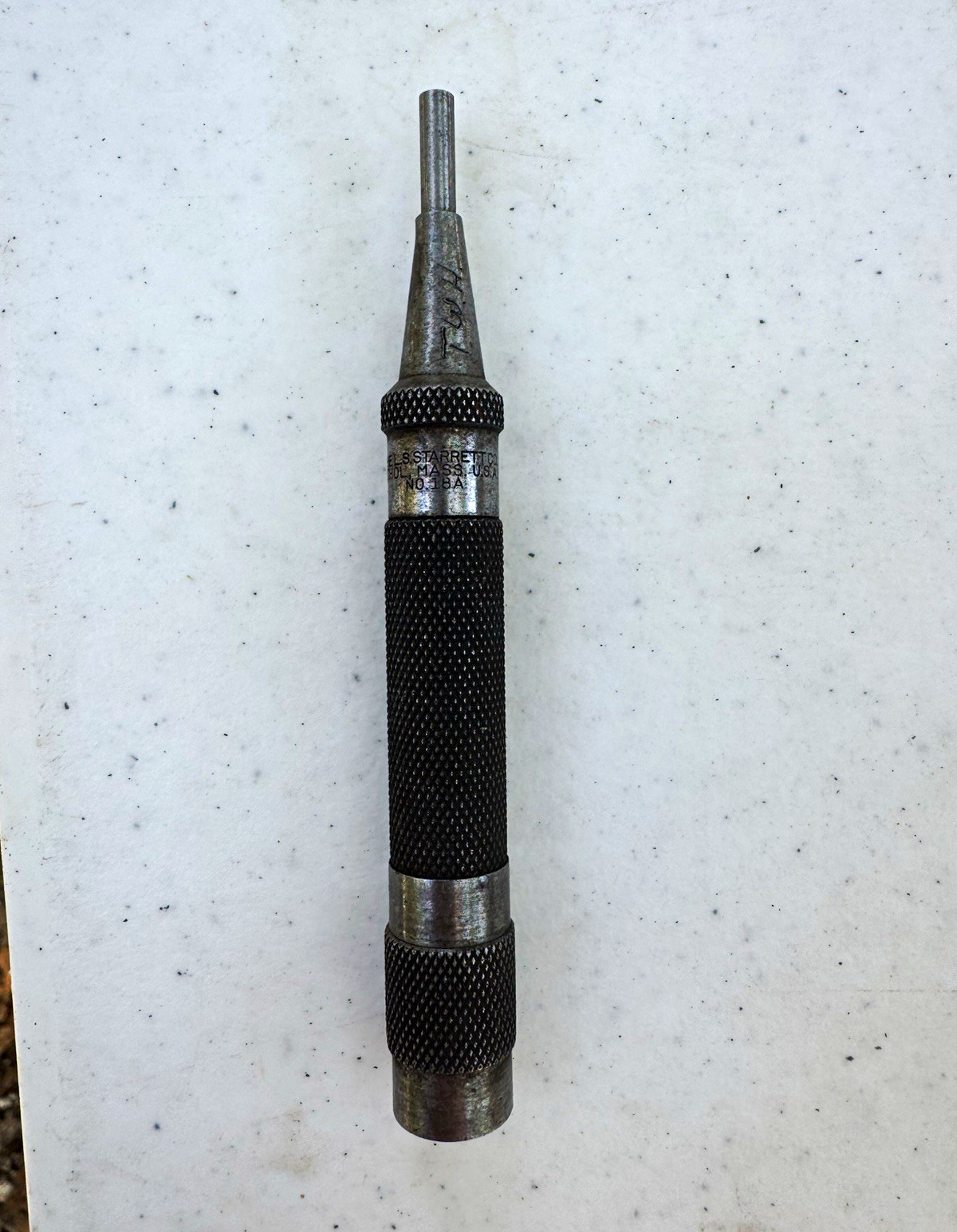 L.S. Starrett No. 18A Center Punch Knurled Steel Silver/Black 5 in x 1/2 in L.S. Starrett No. 18A Center Punch Knurled Steel Silver/Black 5 in x 1/2 in