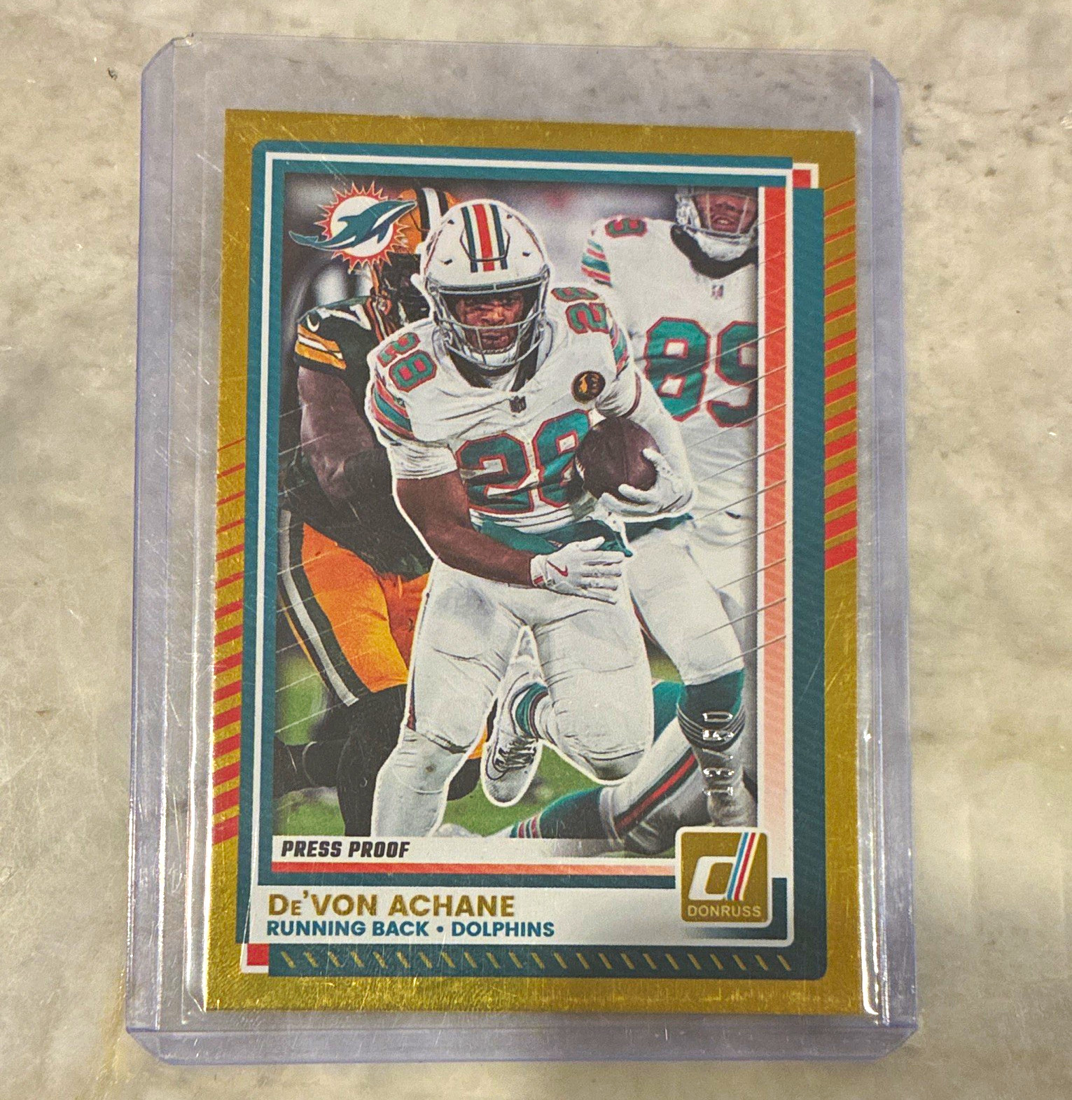 2025 Panini Donruss De\'Von Achane Miami Dolphins #110 Press Proof Gold /50