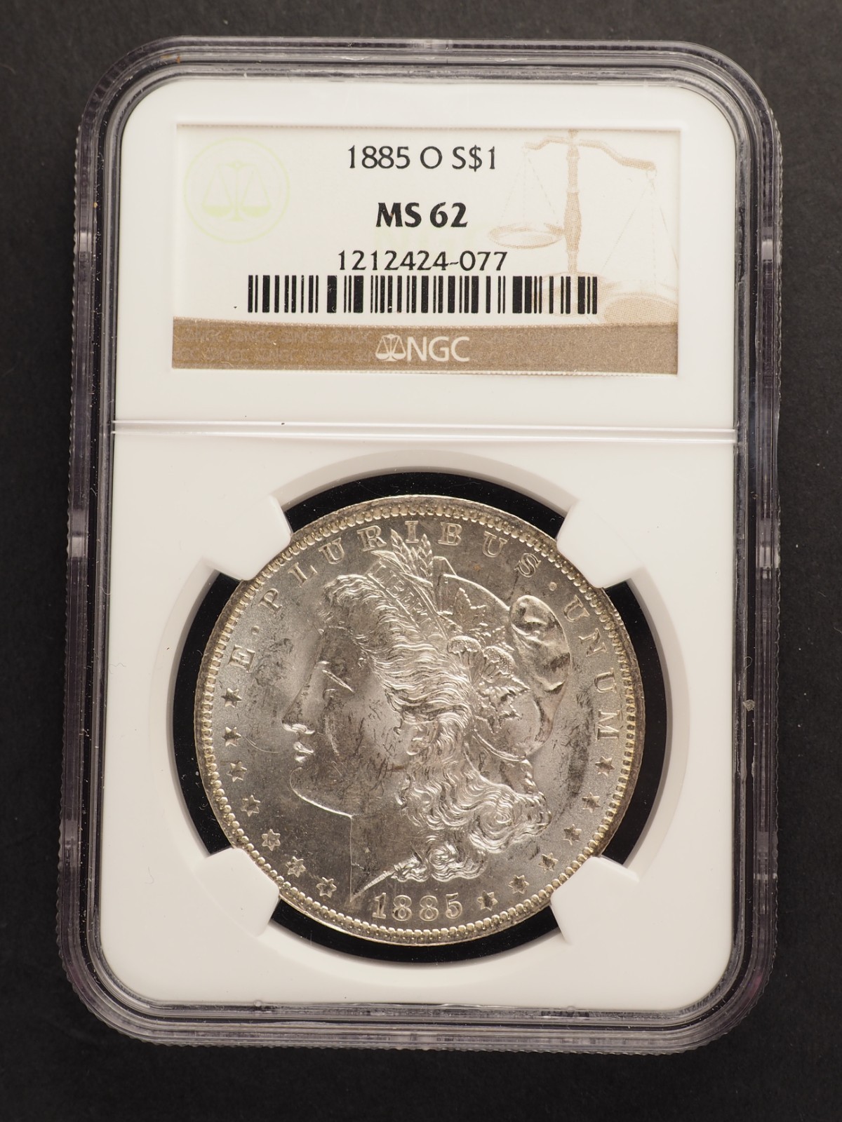 1885 O Morgan Silver Dollar NGC MS 62 - G2498 1885 O Morgan Silver Dollar NGC MS 62 - G2498