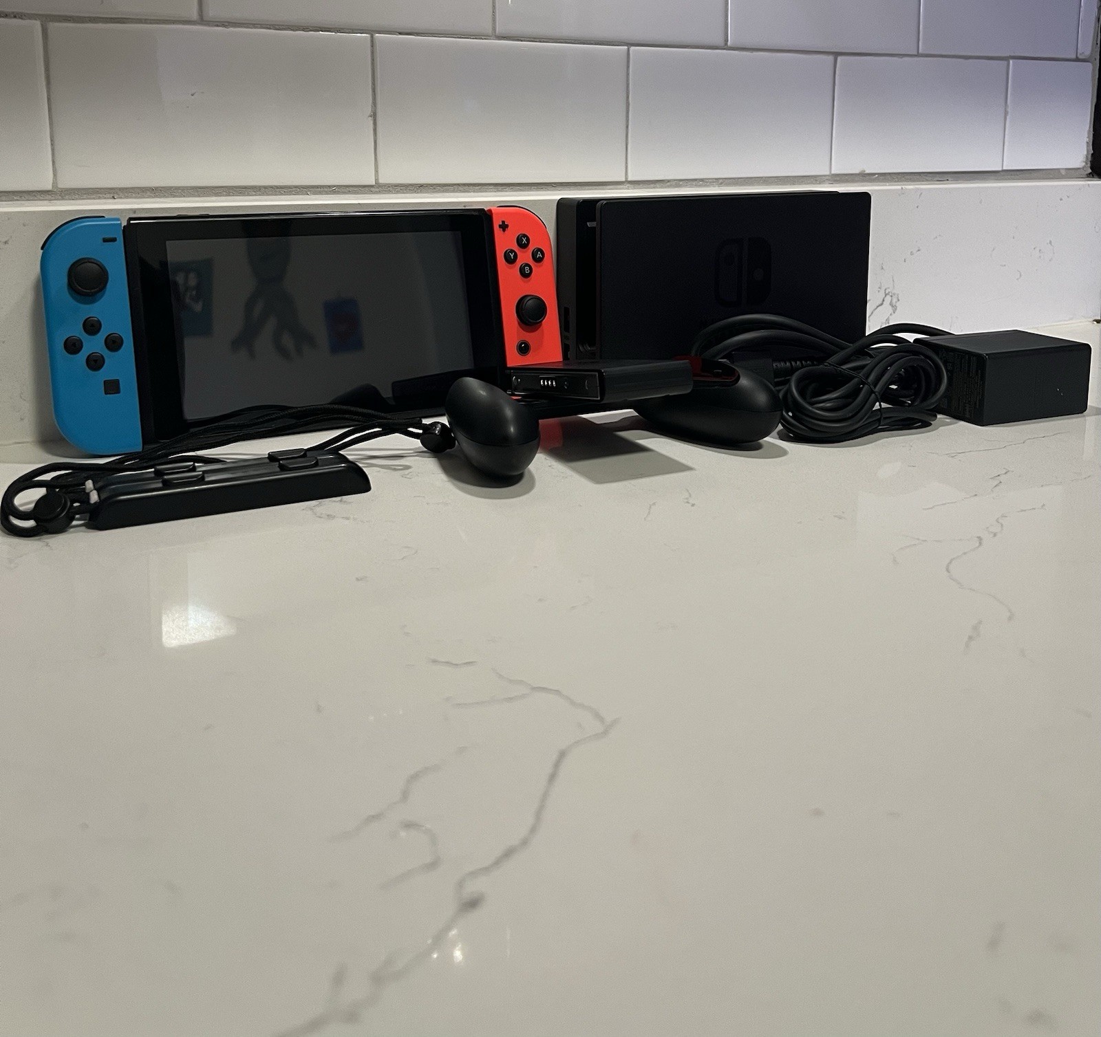 Nintendo Switch 32GB Handheld Console - Blue & Red Joy-Cons With 128 GB SD Card Nintendo Switch 32GB Handheld Console - Blue & Red Joy-Cons With 128 GB SD Card
