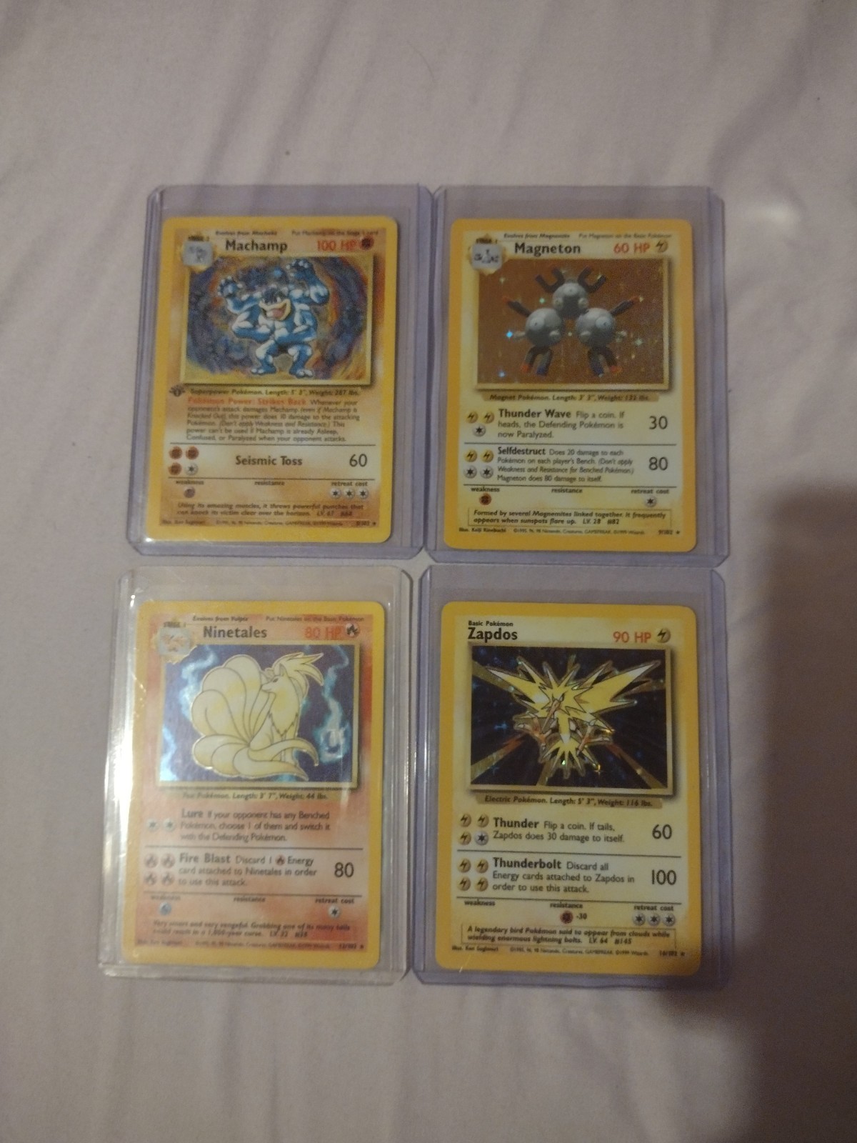 1999 Vintage WOTC Pokémon Base Set Unlimited 4 Card Holo Lot Machamp Zapdos MP