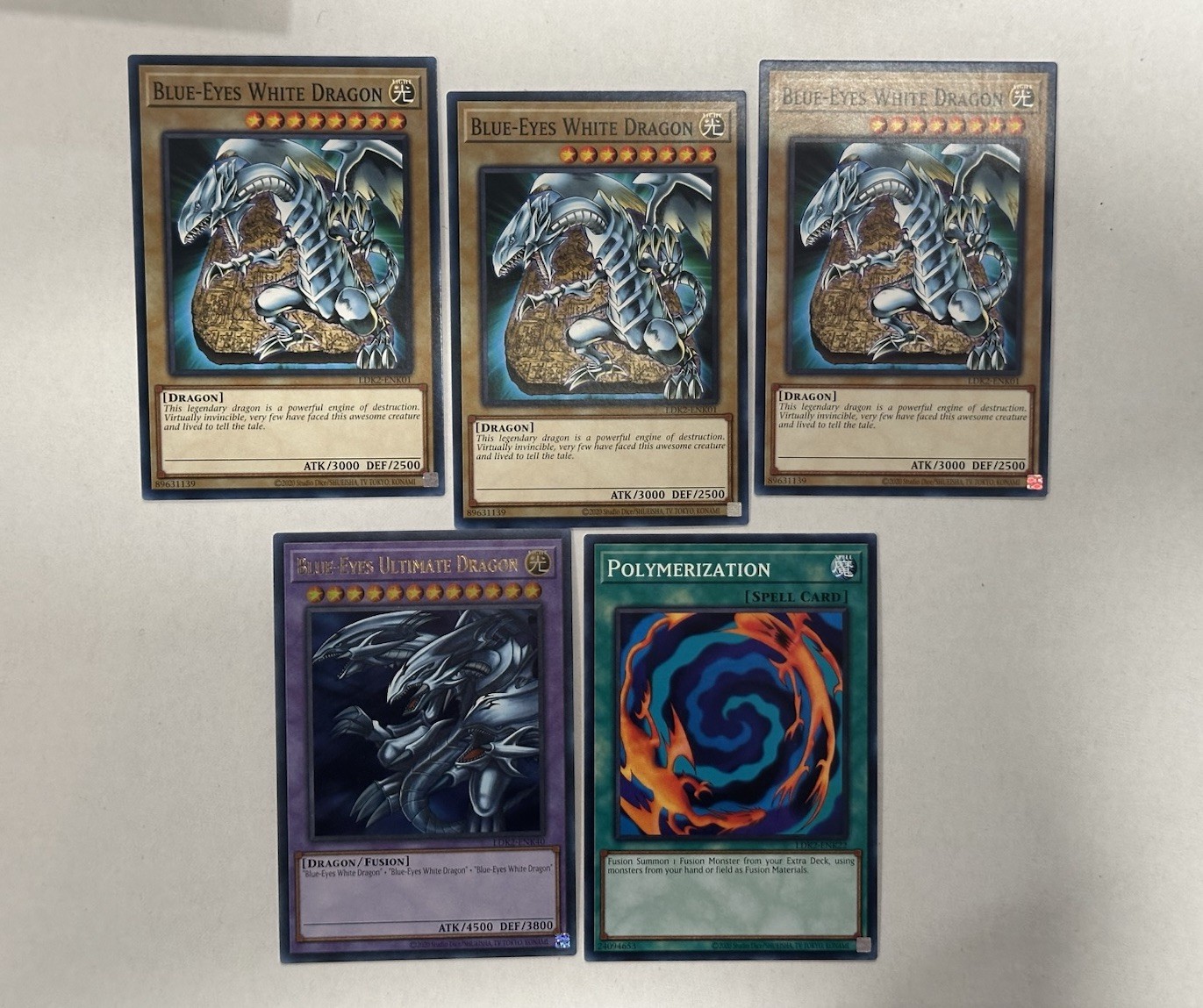 YU-GI-OH 3X BLUE EYES WHITE DRAGON + ULTIMATE DRAGON POLYMERIZATION SET LDK2 NM YU-GI-OH 3X BLUE EYES WHITE DRAGON + ULTIMATE DRAGON POLYMERIZATION SET LDK2 NM