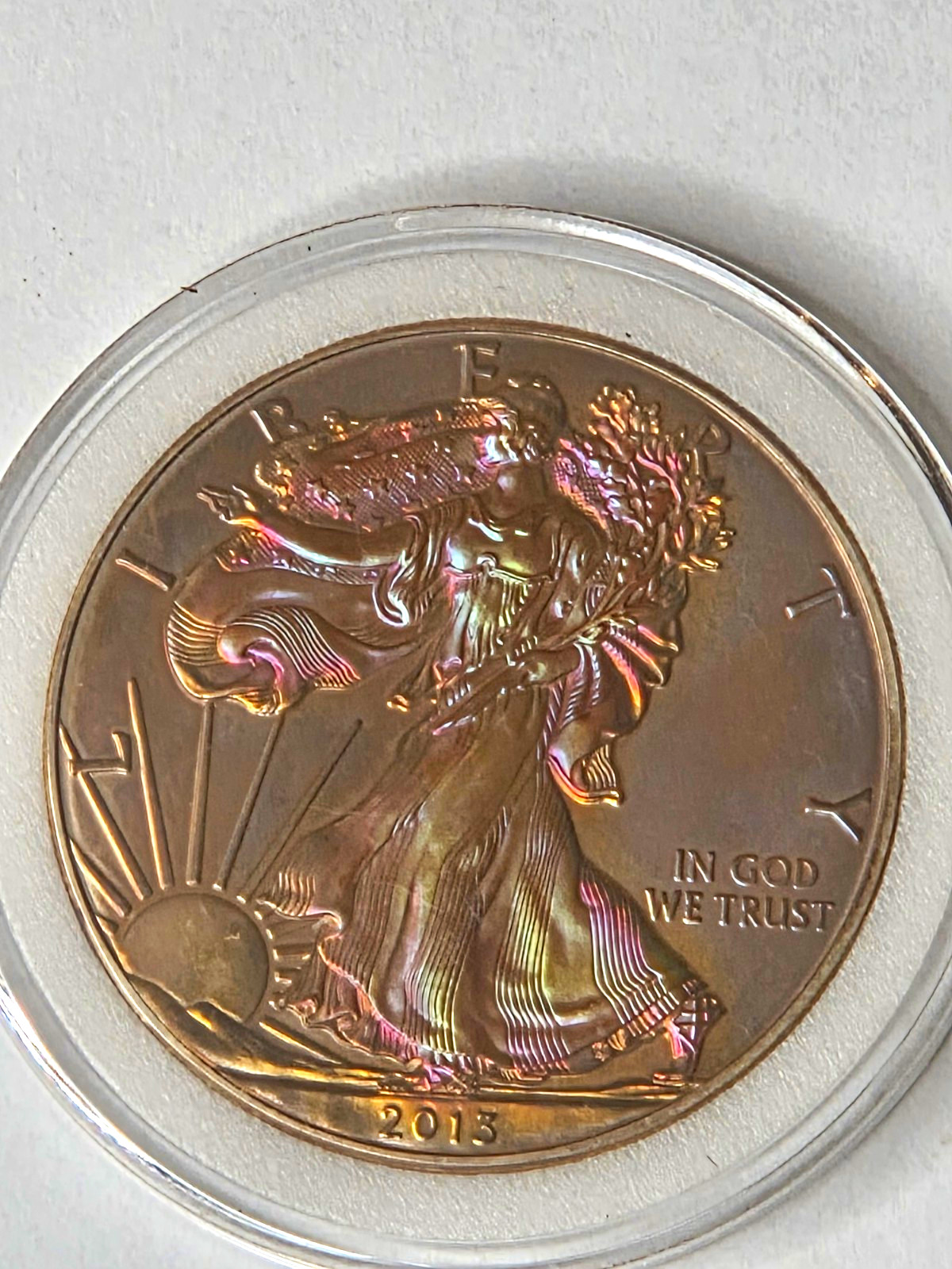 2013 $1 American Silver Eagle 1 oz .999 Silver BU - Gorgeous Sunset Rim Toning