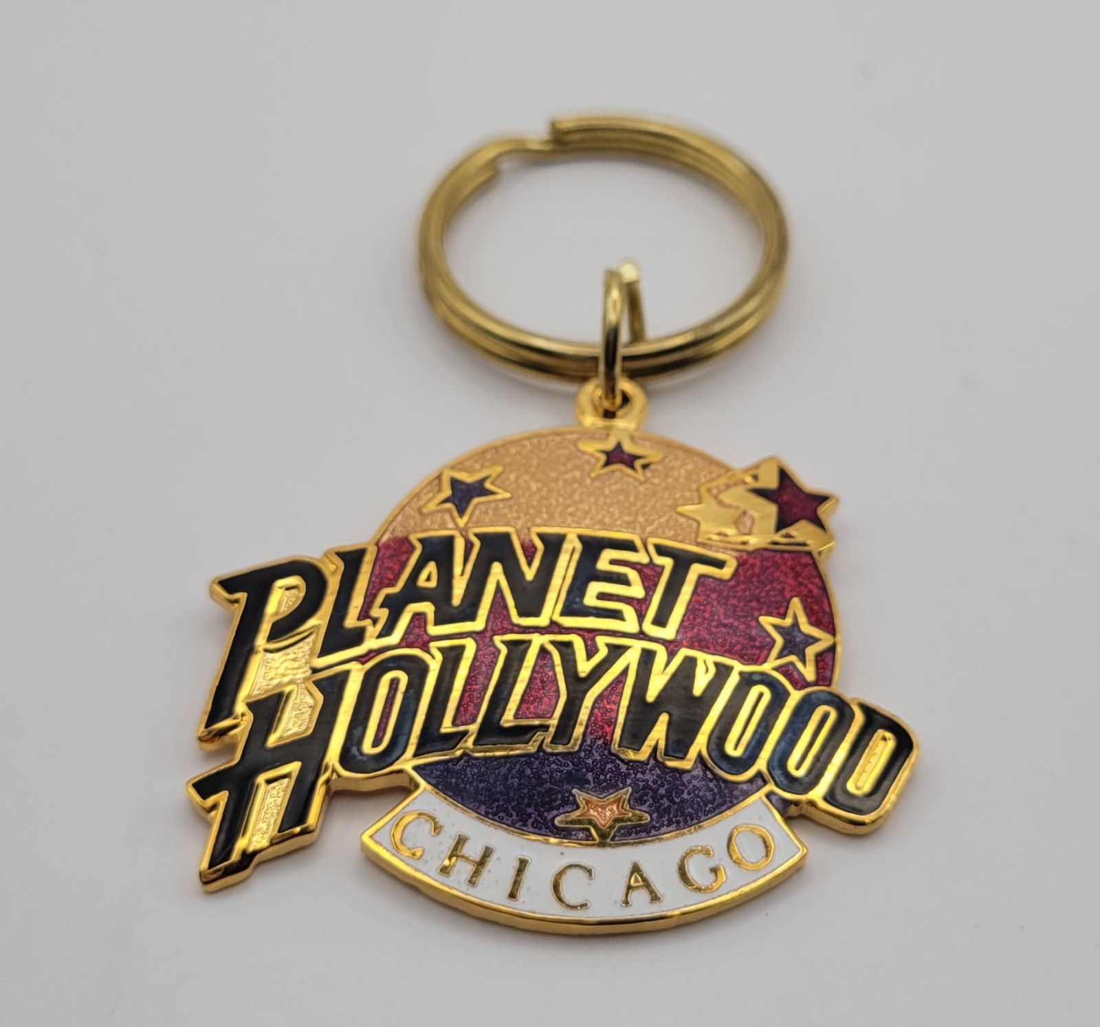 VTG 1990s Planet Hollywood Restaurant Chicago Gold Tone Enamel Keychain NOS