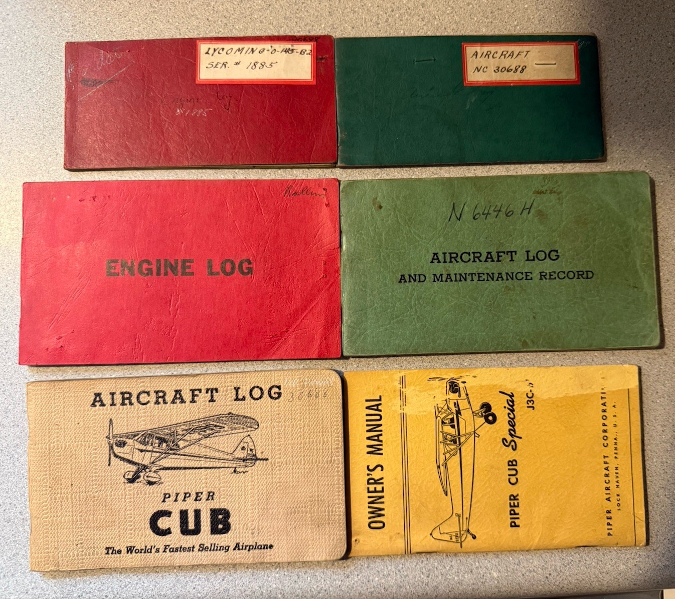 Lot Of 5 Piper Cub Maintenance Logs + Owners Manual Lot Of 5 Piper Cub Maintenance Logs + Owners Manual