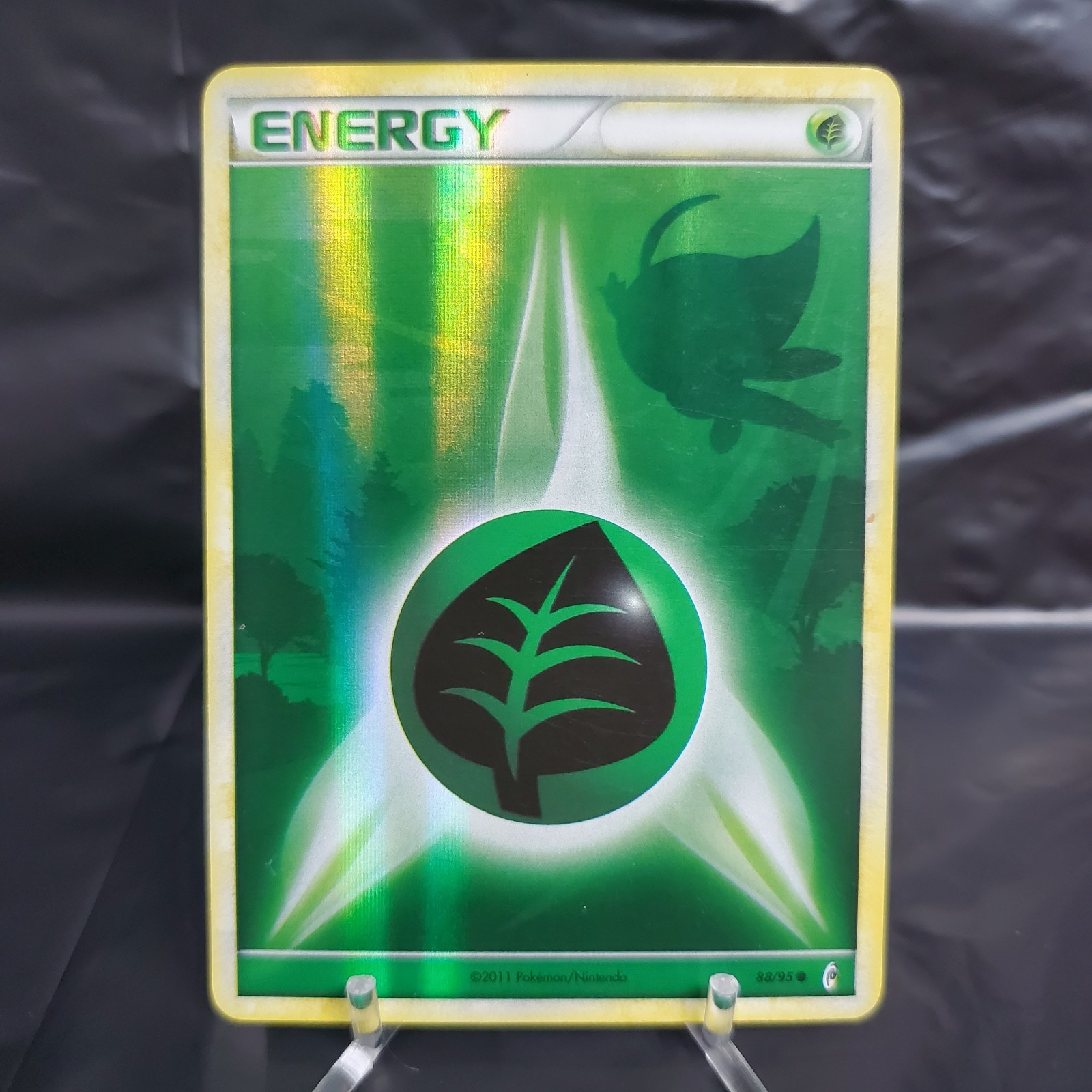 2011 Pokemon Call of Legends Grass Energy 88/95 Reverse Holo Celebi LP
