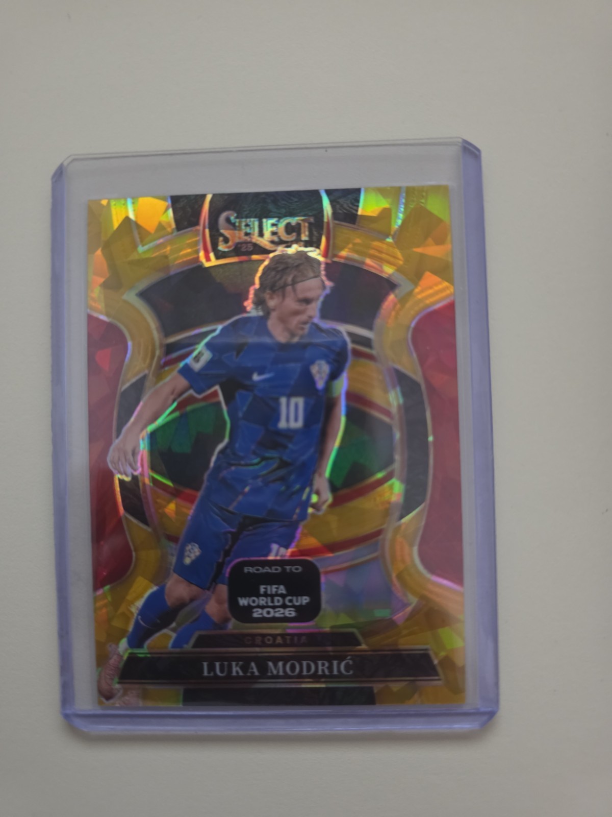 25-26 PANINI SELECT FIFA WORLD CUP LUKA MODRIC /10 GOLD ICE PRIZM TERRACE NO. 35 25-26 PANINI SELECT FIFA WORLD CUP LUKA MODRIC /10 GOLD ICE PRIZM TERRACE NO. 35