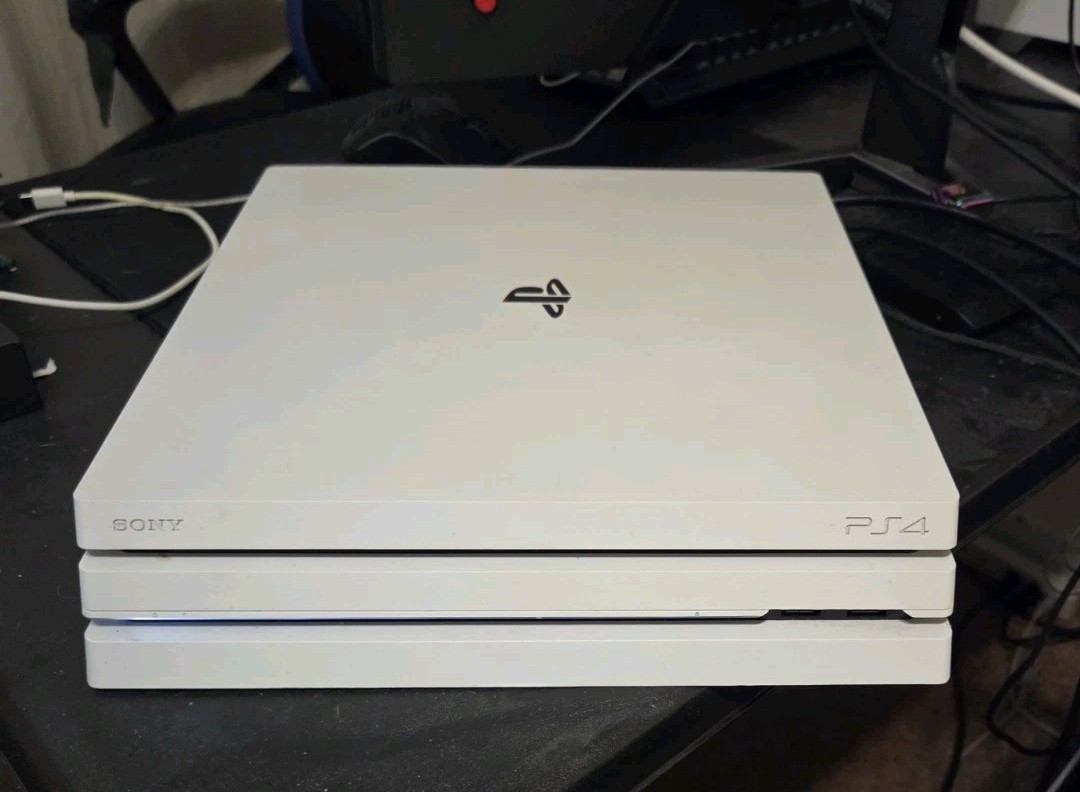 PS4 Pro 1tb w/ 2 Controllers, Games & Box