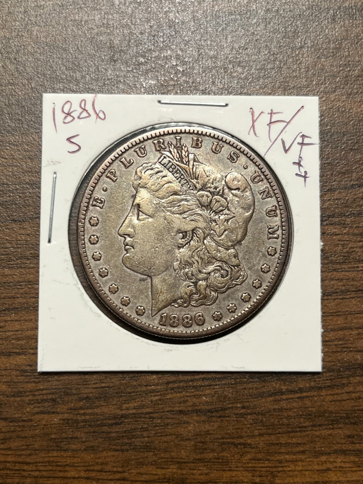 1886 S Morgan silver dollar XF #674 GENUINE GUARANTEE 1886 S Morgan silver dollar XF #674 GENUINE GUARANTEE