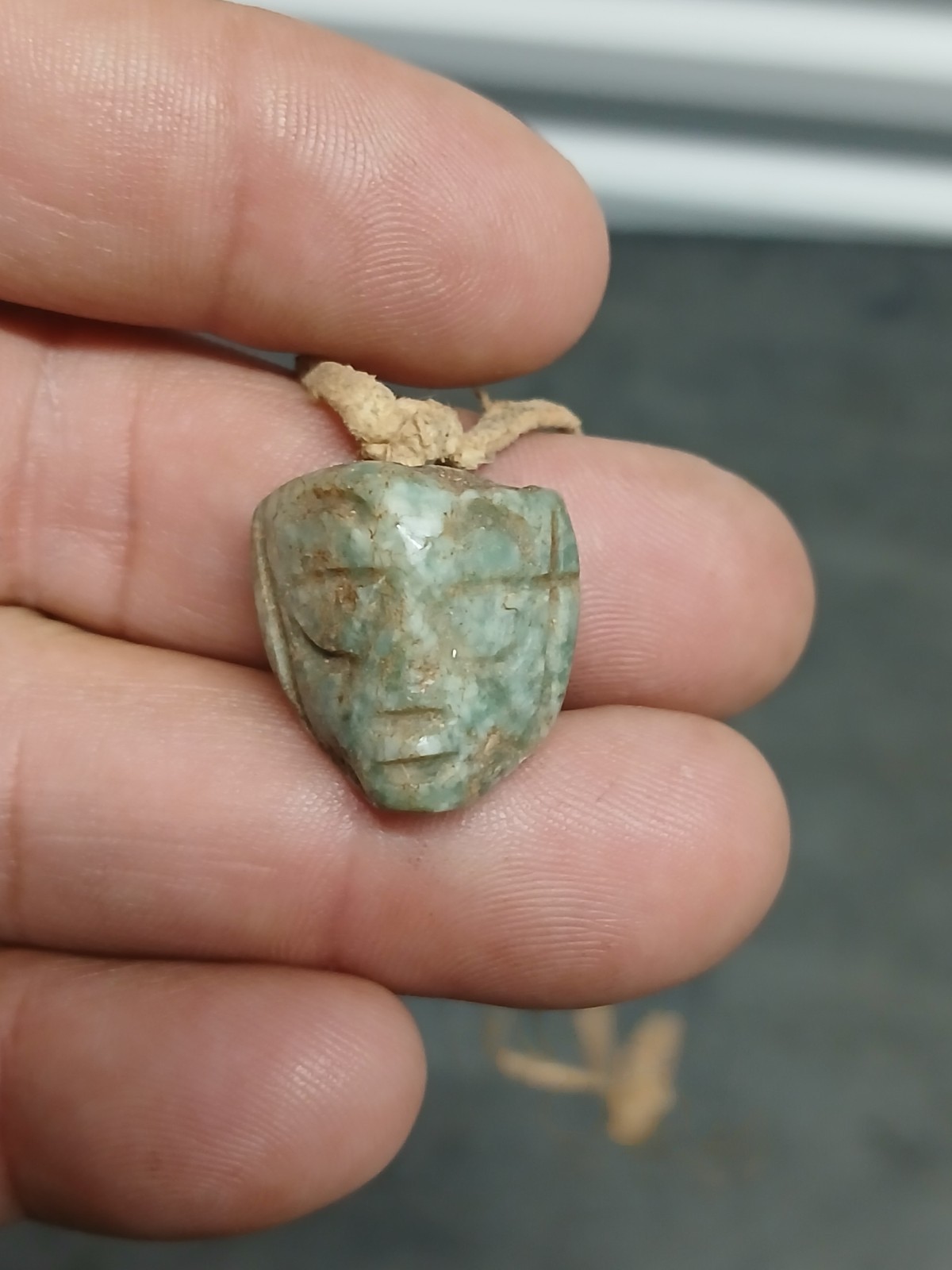 AUTHENTIC PRE-COLUMBIAN CARVED JADE MINIATURE HEAD ON ROPE NECKLACE AUTHENTIC PRE-COLUMBIAN CARVED JADE MINIATURE HEAD ON ROPE NECKLACE