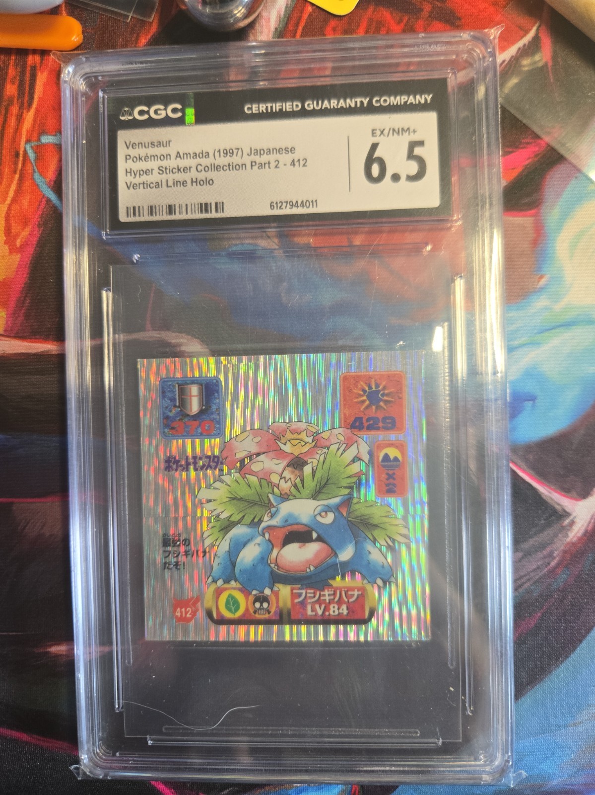 Pokémon Red Back 1997 Hyper Sticker Amada Vertical Line Venusaur CGC 6.5 Pokémon Red Back 1997 Hyper Sticker Amada Vertical Line Venusaur CGC 6.5