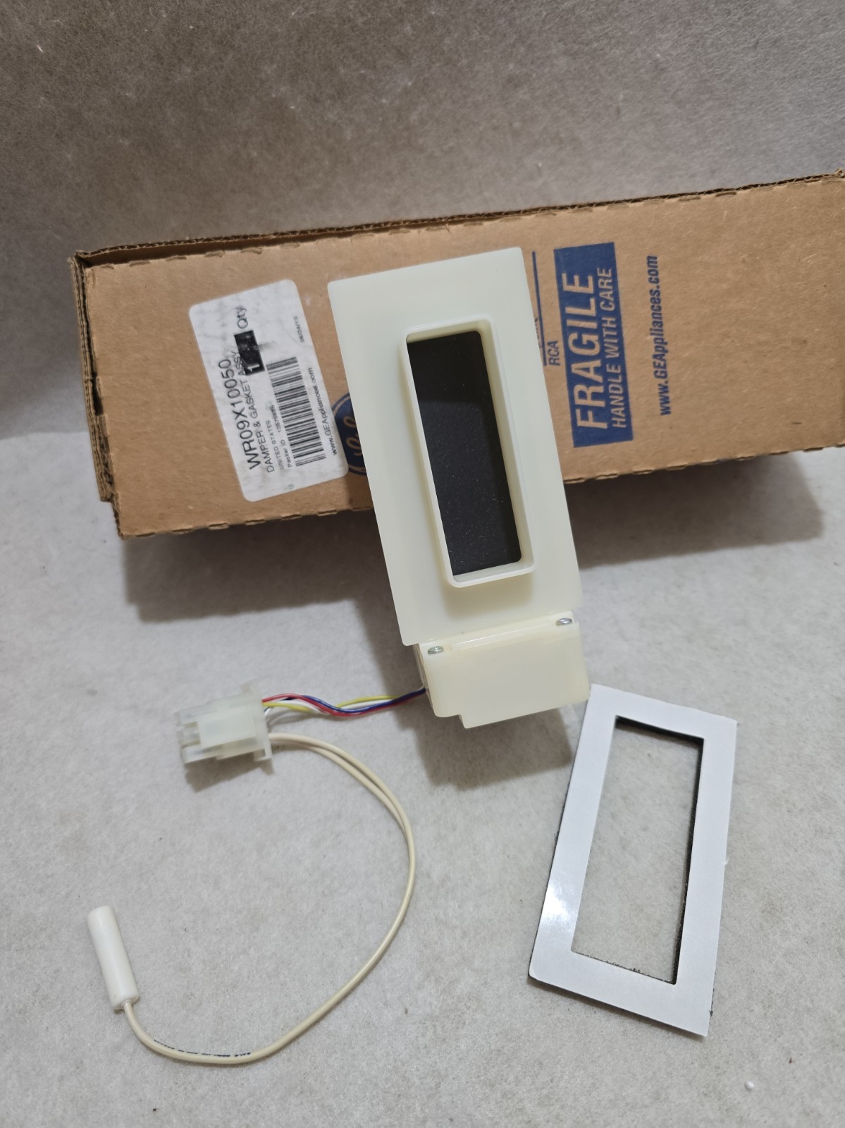 Brand new genuine GE WR09X10050  NEW Refrigerator Damper with Gasket