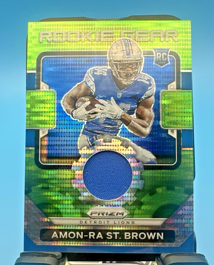 2021 Panini Prizm Rookie Gear Amon-Ra St Brown RG28 Neon Green Pulsar Prizm RC