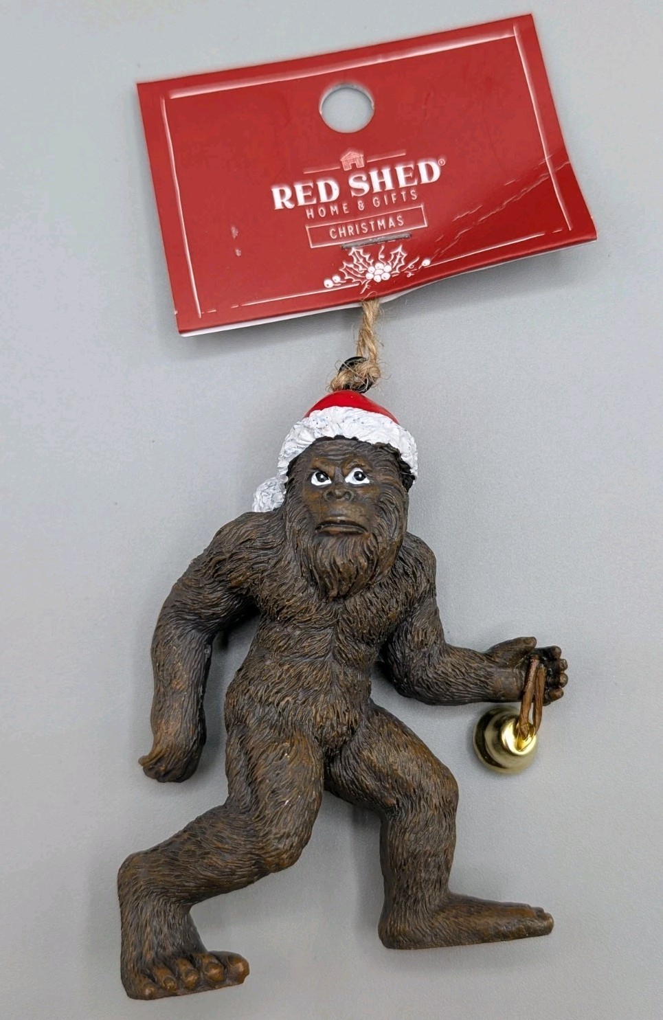 Bigfoot Wearing Santa Hat Walking With Bell Red Shed Ornament NWT Bigfoot Wearing Santa Hat Walking With Bell Red Shed Ornament NWT