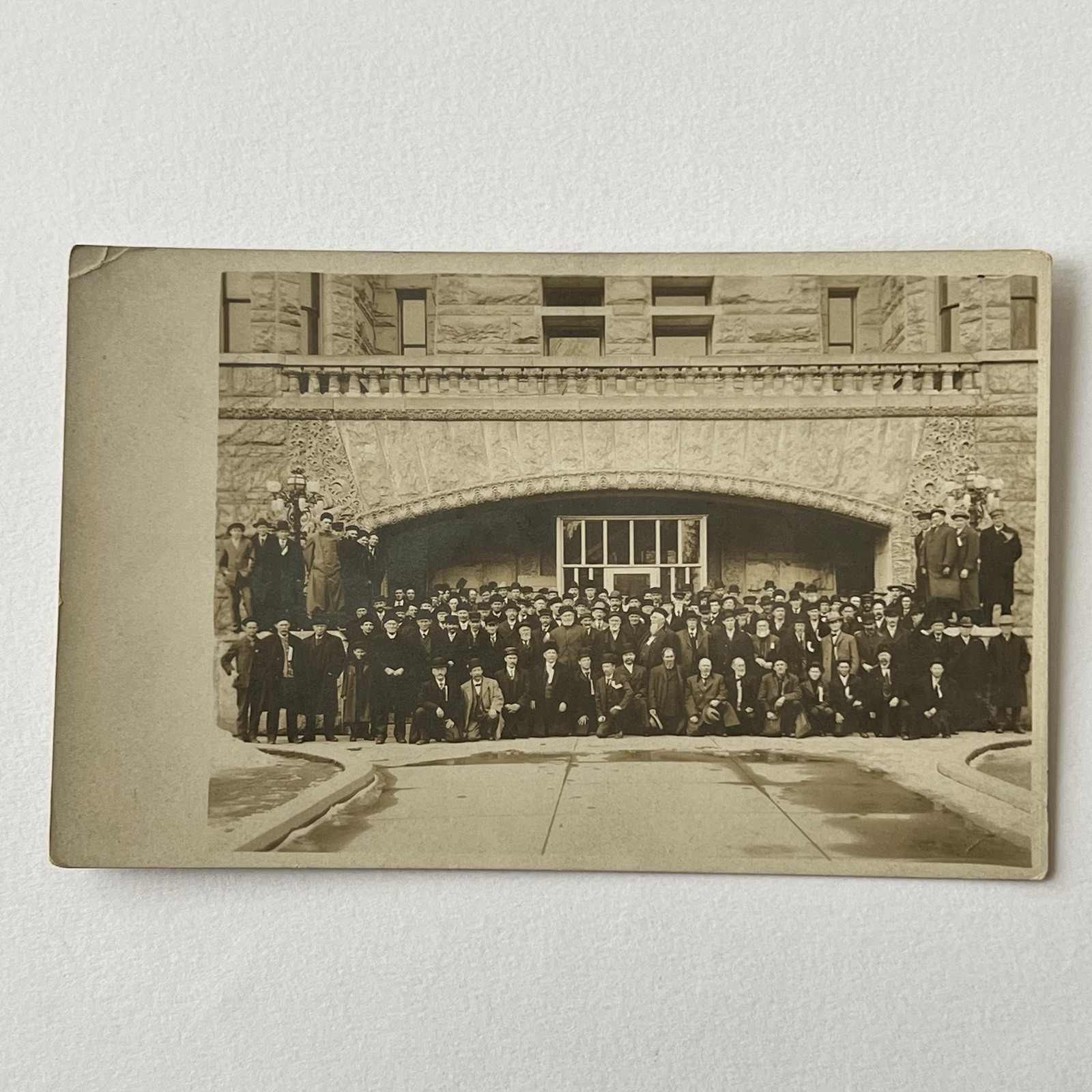 Antique RPPC Photograph Postcard Very Large Group Men Beautiful Building