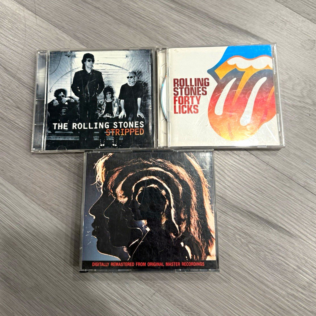 The Rolling Stones CD Lot - Stripped / Forty Licks / Hot Rocks ABKCO Jewel The Rolling Stones CD Lot - Stripped / Forty Licks / Hot Rocks ABKCO Jewel