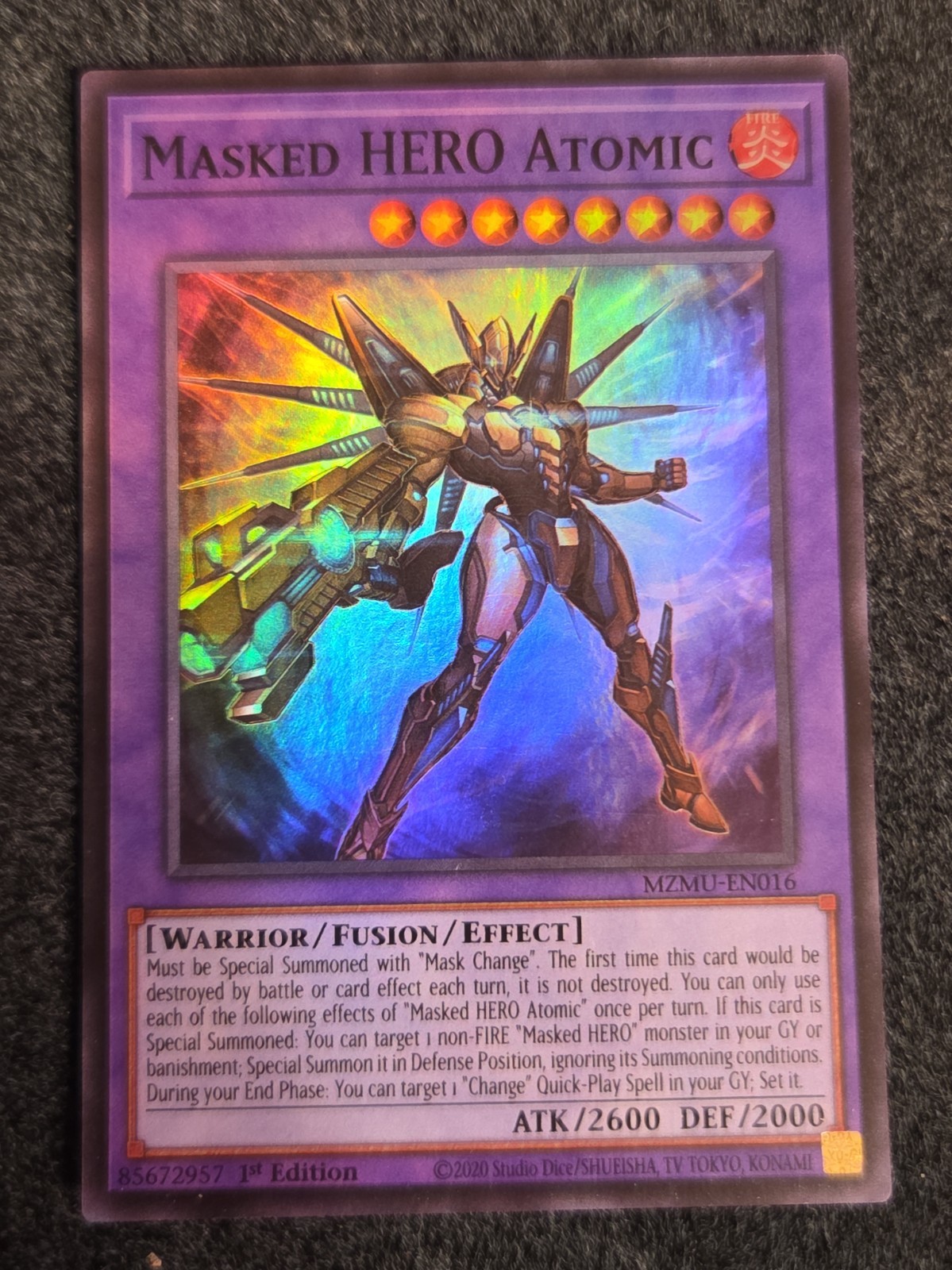 1X NM Masked HERO Atomic - MZMU-EN016 - Super Rare 1st Edition