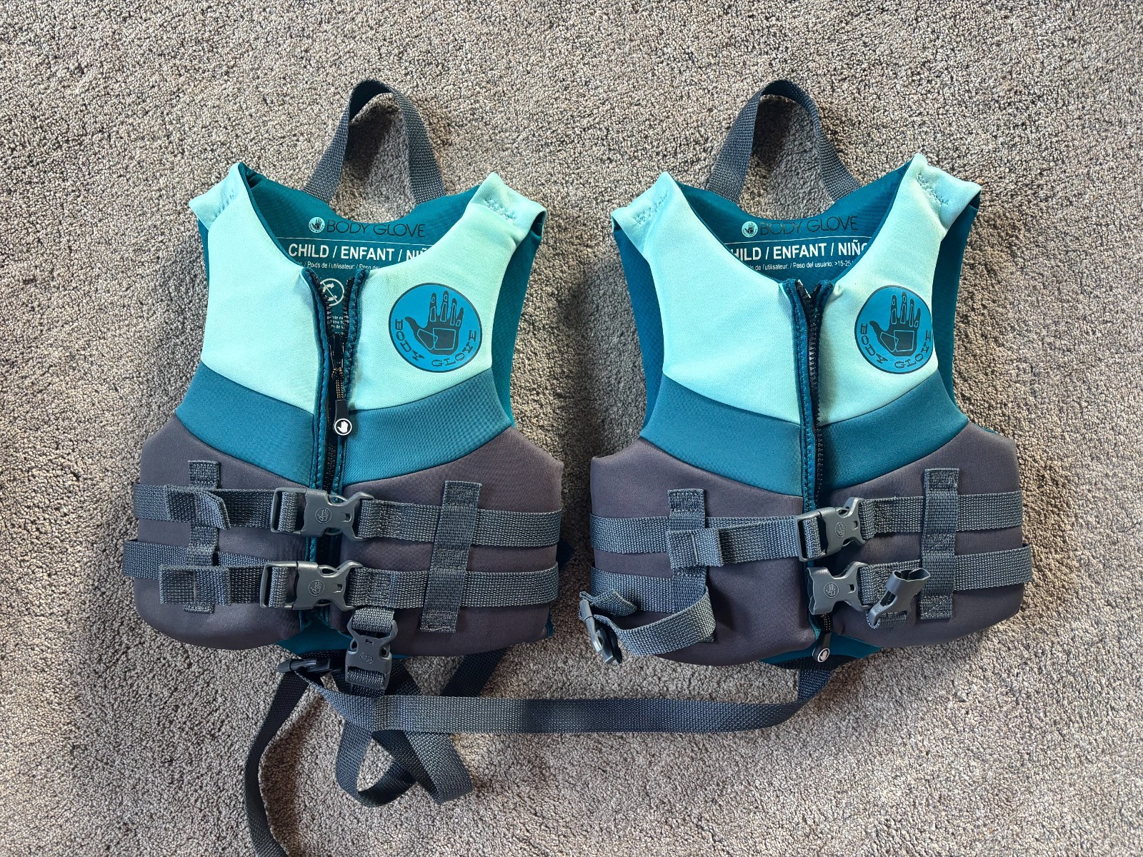 Body Glove 323C Life Jacket Vest Kids / Child / Infant - Aqua (lot of TWO vests) Body Glove 323C Life Jacket Vest Kids / Child / Infant - Aqua (lot of TWO vests)