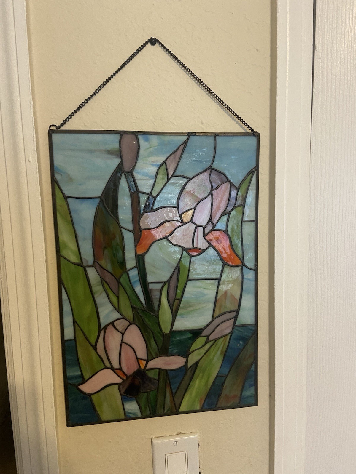 This specific handcrafted iris stained glass panel This specific handcrafted iris stained glass panel