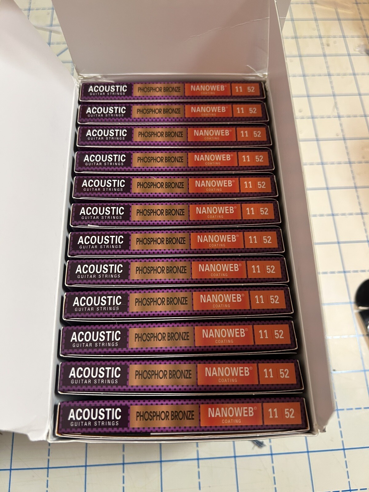 Elixir Nanoweb Phosphor Bronze Custom Light Acoustic Guitar Strings 11-52 12Pack Elixir Nanoweb Phosphor Bronze Custom Light Acoustic Guitar Strings 11-52 12Pack