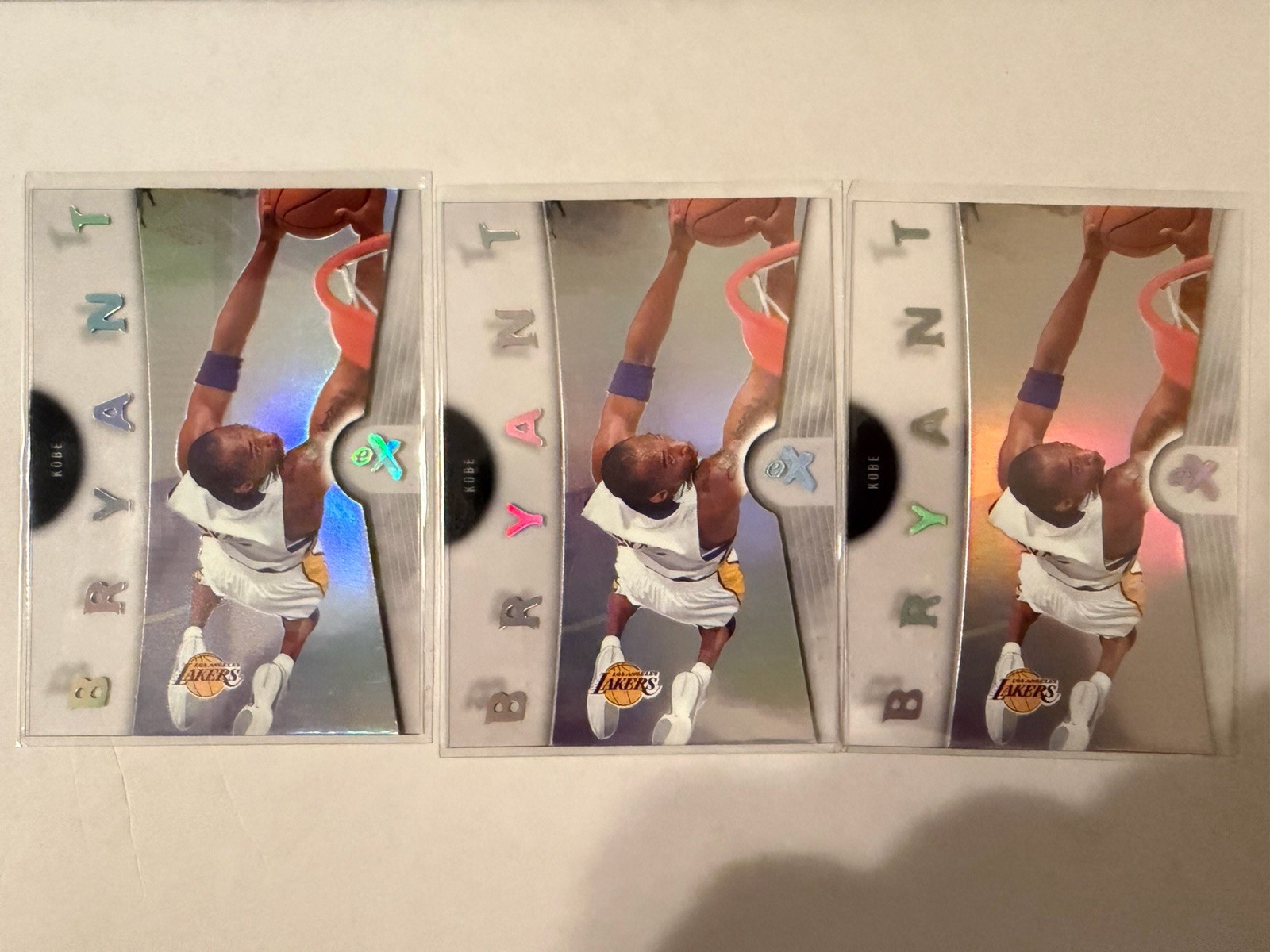 2006/07 Fleer E-X Kobe Bryant Base Lot Of 3 2006/07 Fleer E-X Kobe Bryant Base Lot Of 3