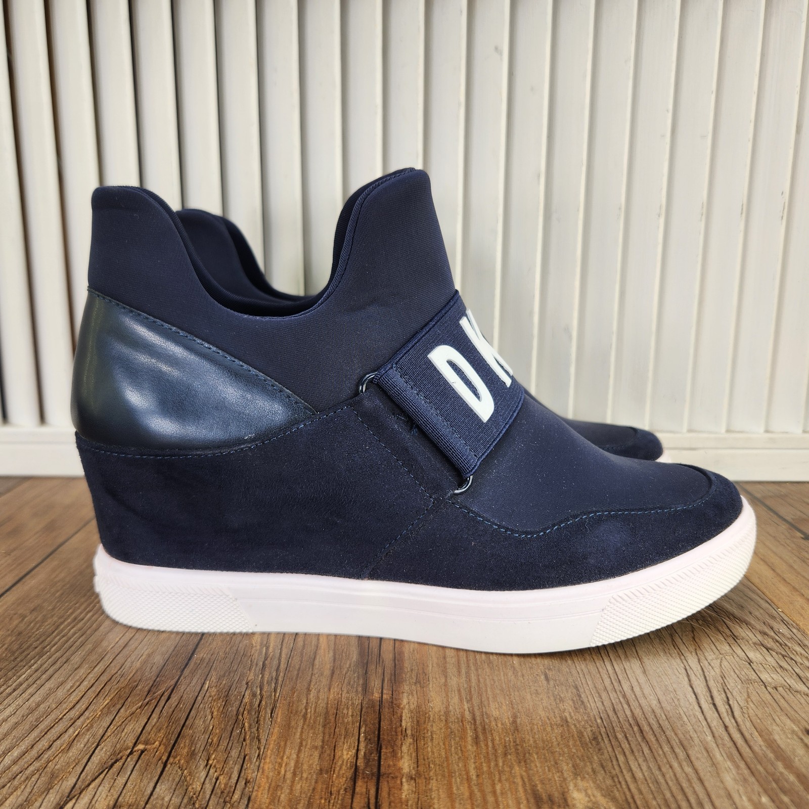 DKNY Cosmos Wedge Sneakers Womens Size 8.5 M Navy Blue Hidden Heel Slip On Shoes