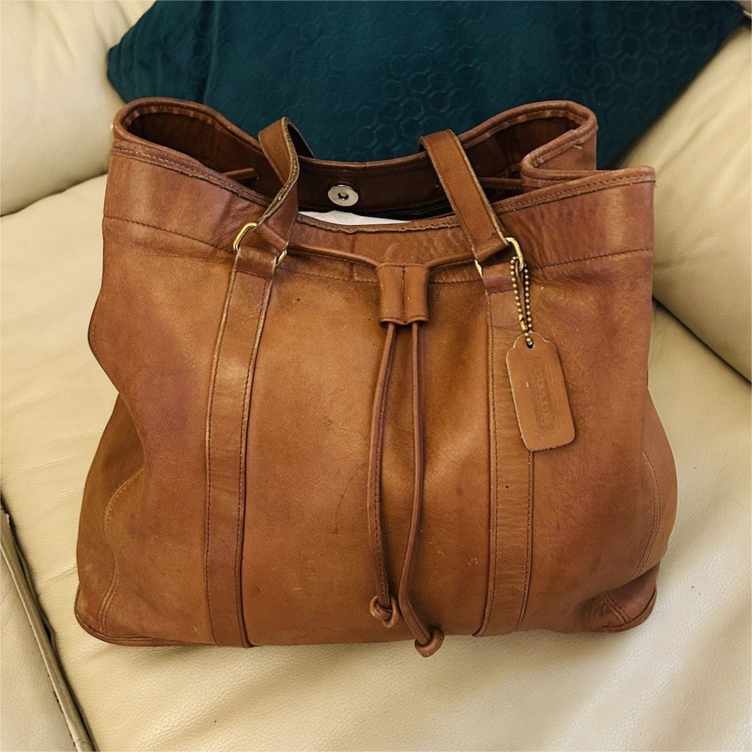 Coach Vintage bag needs cleaning and restoration stained inside and outside 