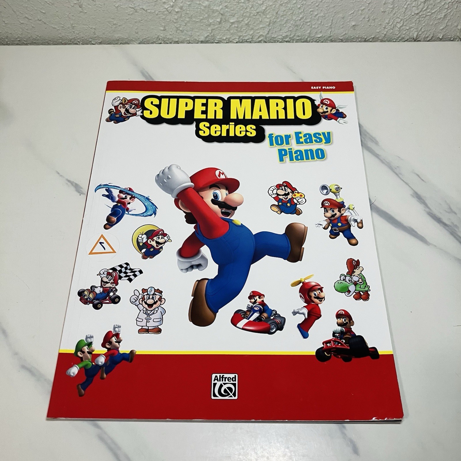 Super Mario™ Series for Easy Piano: 34 Super Mario™ Themes Alfred Music Super Mario™ Series for Easy Piano: 34 Super Mario™ Themes Alfred Music
