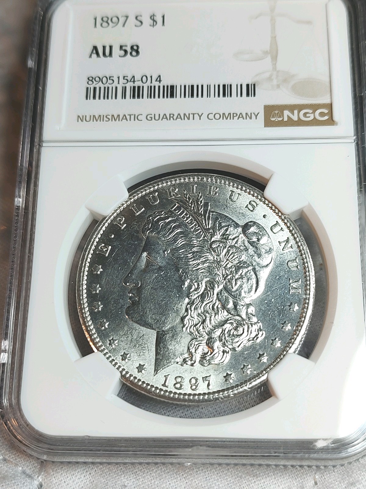 1897 S Morgan Dollar AU 58