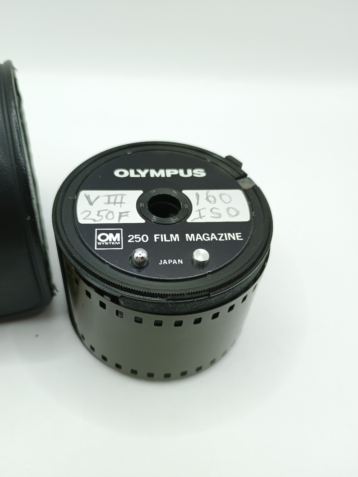 Olympus OM 250 Film Magazine w/ Vintage ISO 160 Film + Leather Case Olympus OM 250 Film Magazine w/ Vintage ISO 160 Film + Leather Case