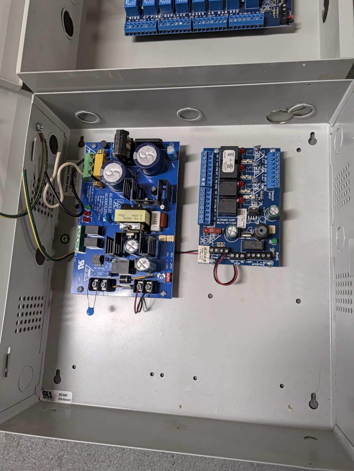 Altronix AL400ULX Power Supply + ACM4CB Access Power Controller in Enclosure