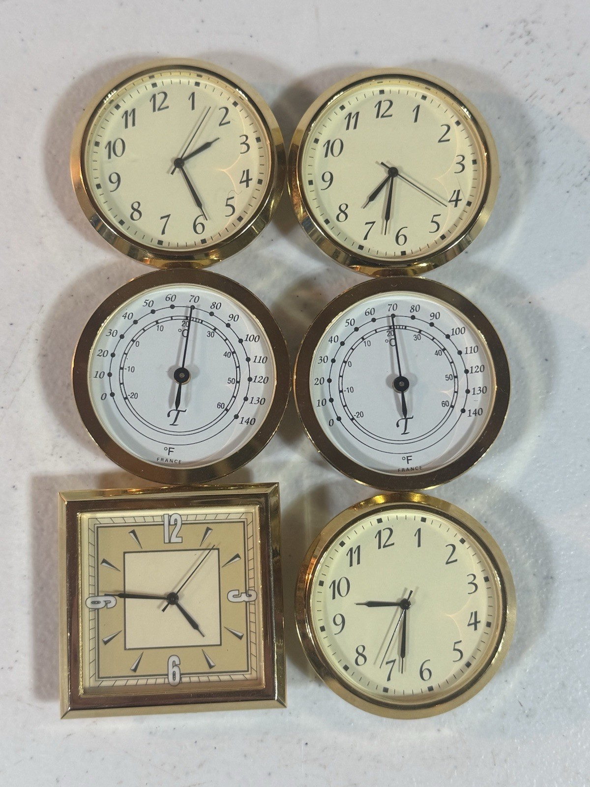 Lot of 6 Vintage Skron Electronics Clocks & French Thermometers – Brass Tone Lot of 6 Vintage Skron Electronics Clocks & French Thermometers – Brass Tone