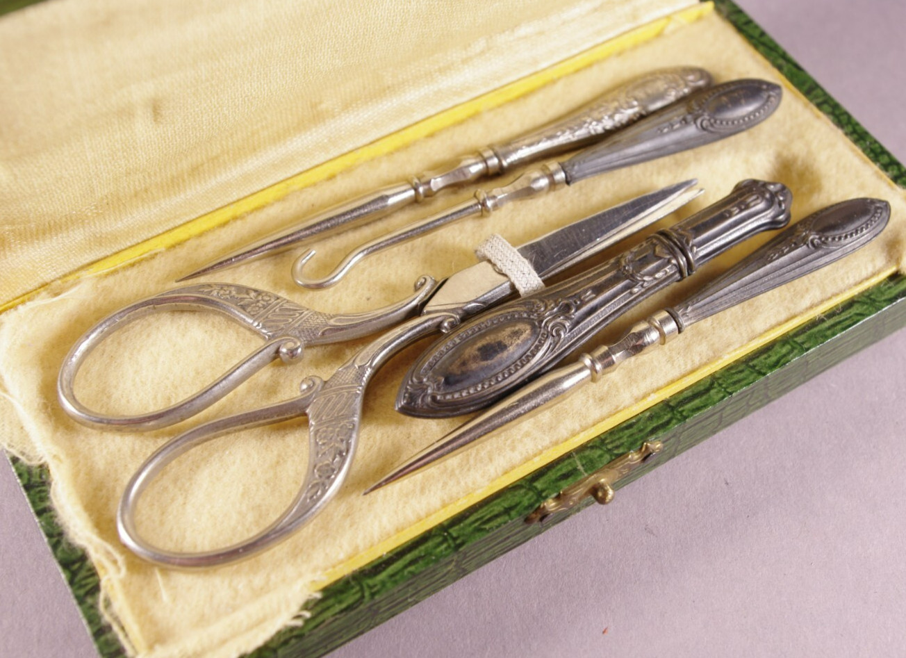 Antique sewing kit from early 20th century Europe