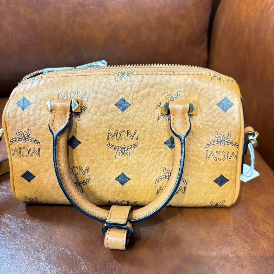 Authentic Pre-Owned MCM Aren Visetos Mini Boston Pillow Bag.