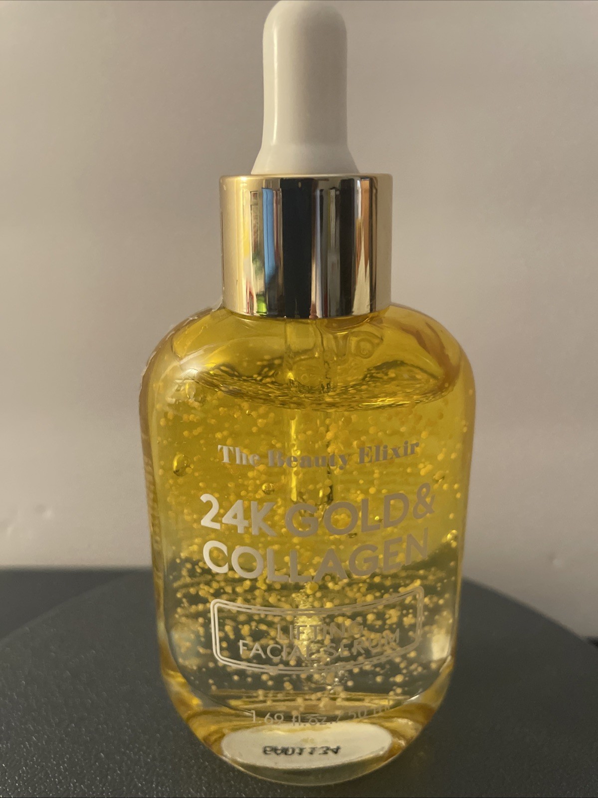 The Beauty Elixir 24K Gold Collagen Lifting Serum 1.69 fl Oz. NEW The Beauty Elixir 24K Gold Collagen Lifting Serum 1.69 fl Oz. NEW