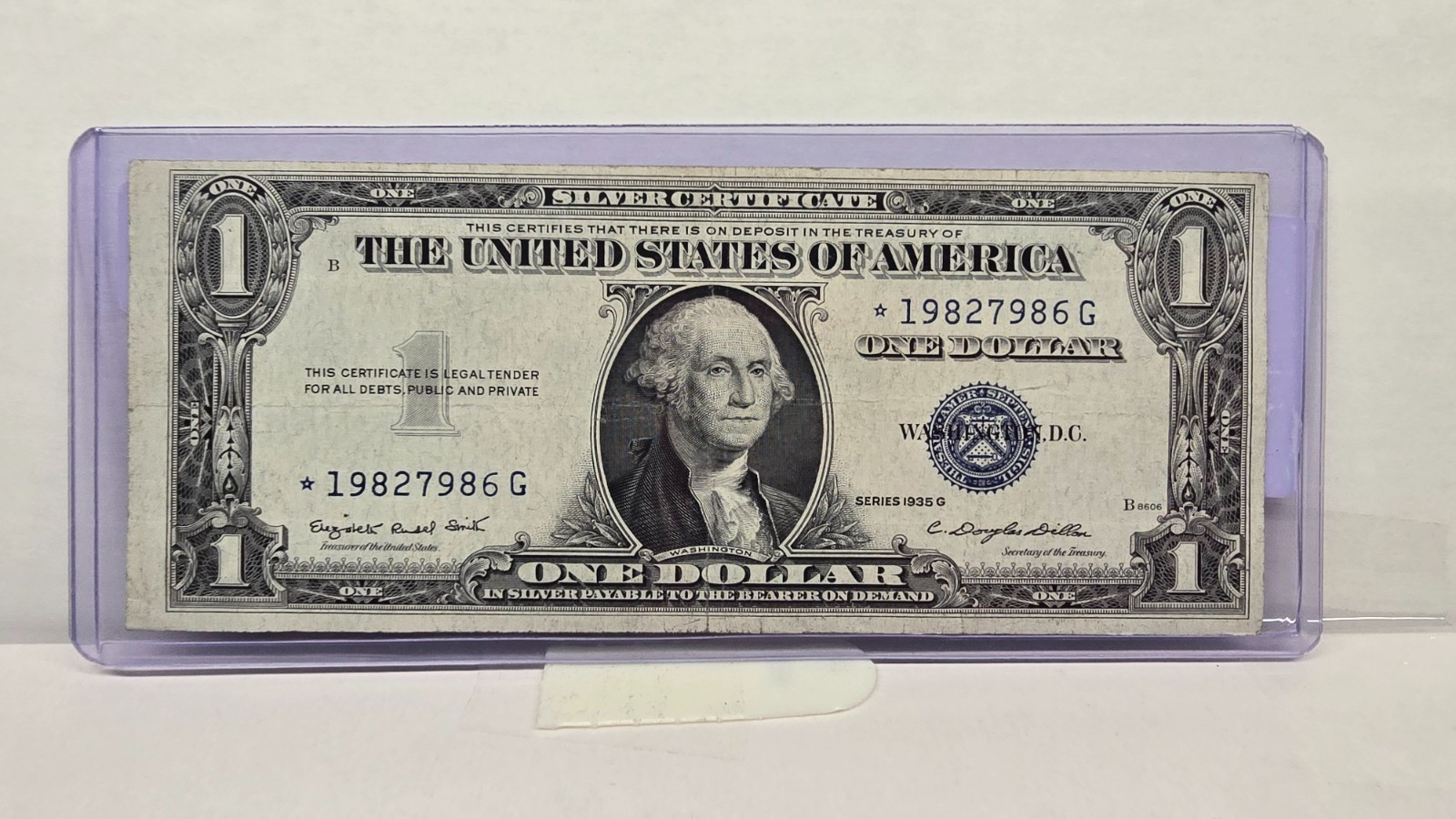 Series 1935G $1 Silver Cert. Star Note (986J)– With Motto & Obverse Misalignment Series 1935G $1 Silver Cert. Star Note (986J)– With Motto & Obverse Misalignment