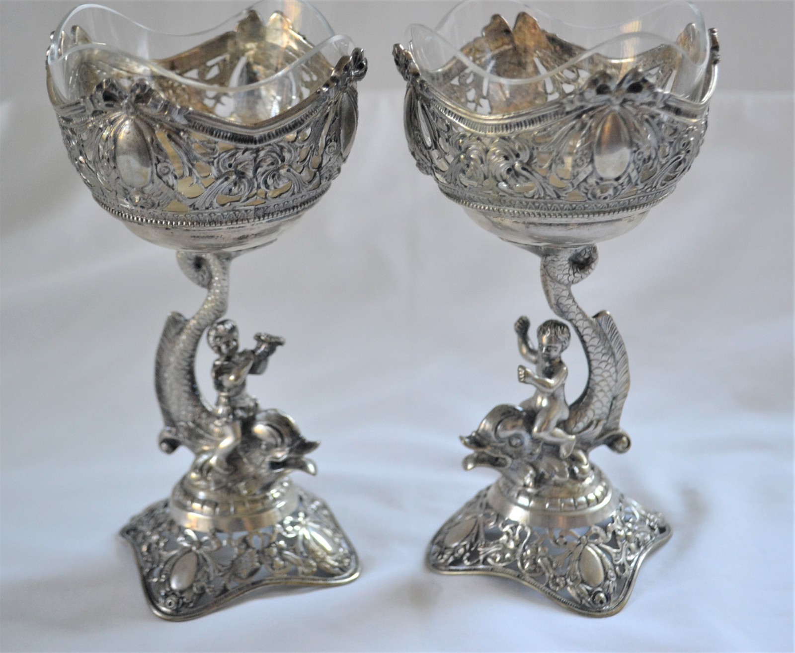 Antique Germany Hanau Pair of Master Salts Putti Riding Dolphins 800 Silver Antique Germany Hanau Pair of Master Salts Putti Riding Dolphins 800 Silver