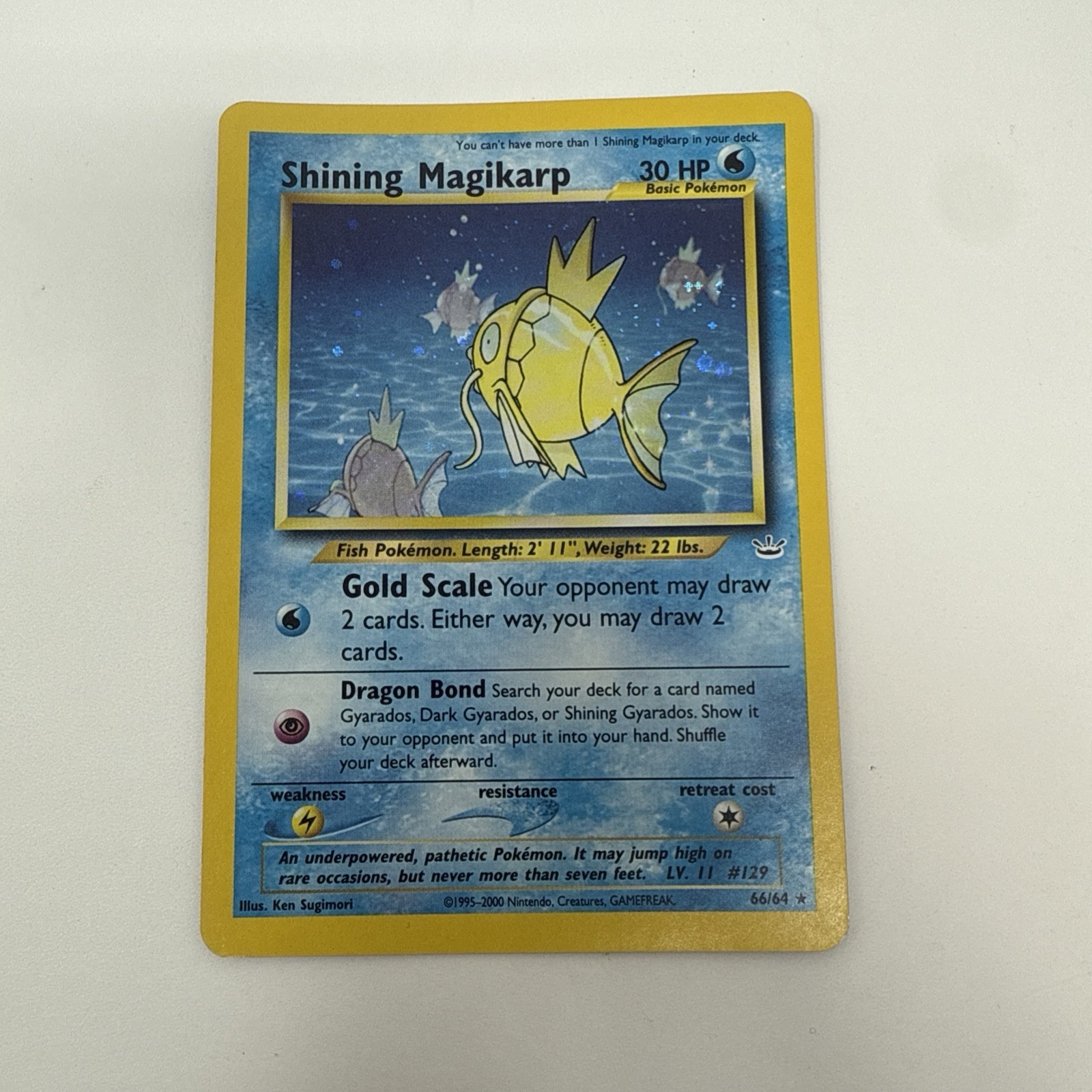 Pokemon Shining Magikarp 66/64 Neo Revelation Holo Unlimited MINOR WATER DAMAGE Pokemon Shining Magikarp 66/64 Neo Revelation Holo Unlimited MINOR WATER DAMAGE