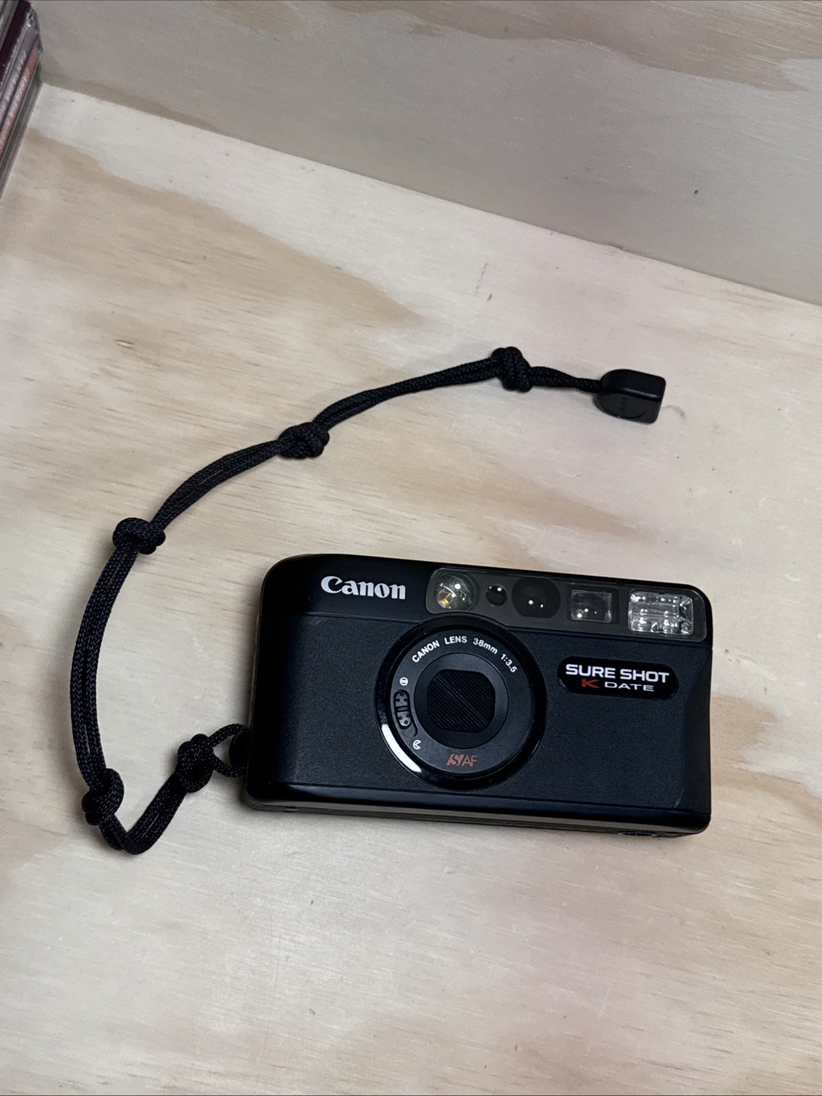 Canon Sure Shot K Date Black Built-In Flash Point & Shoot Film Camera With Strap
