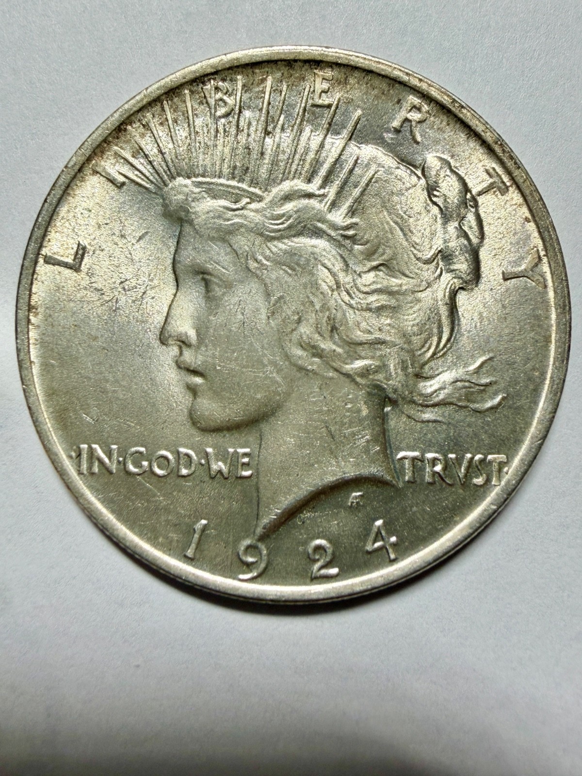 1924-P Peace Silver Dollar.  AI Generated PCGS-Style Grade - AU58; Price $85