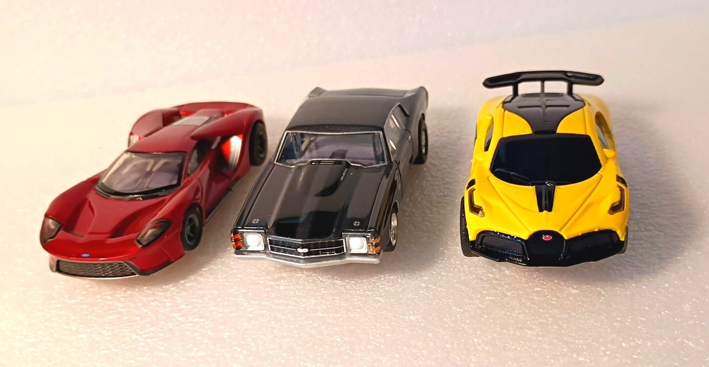 3 AFX Slot cars 2 Mega G+ 1 Off brand Ford F40, Chevy Chevelle, Alfa Romero