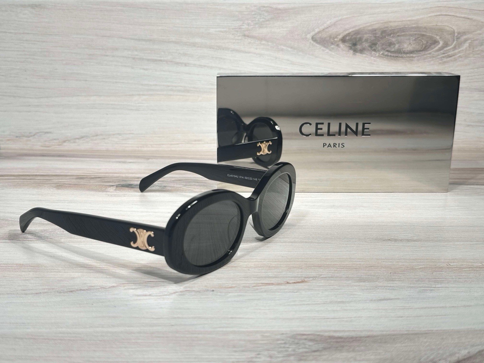 Celine CL40194 Triomphe Oval Shiny Black 01A 40194 Sunglasses - Ships Now Celine CL40194 Triomphe Oval Shiny Black 01A 40194 Sunglasses - Ships Now