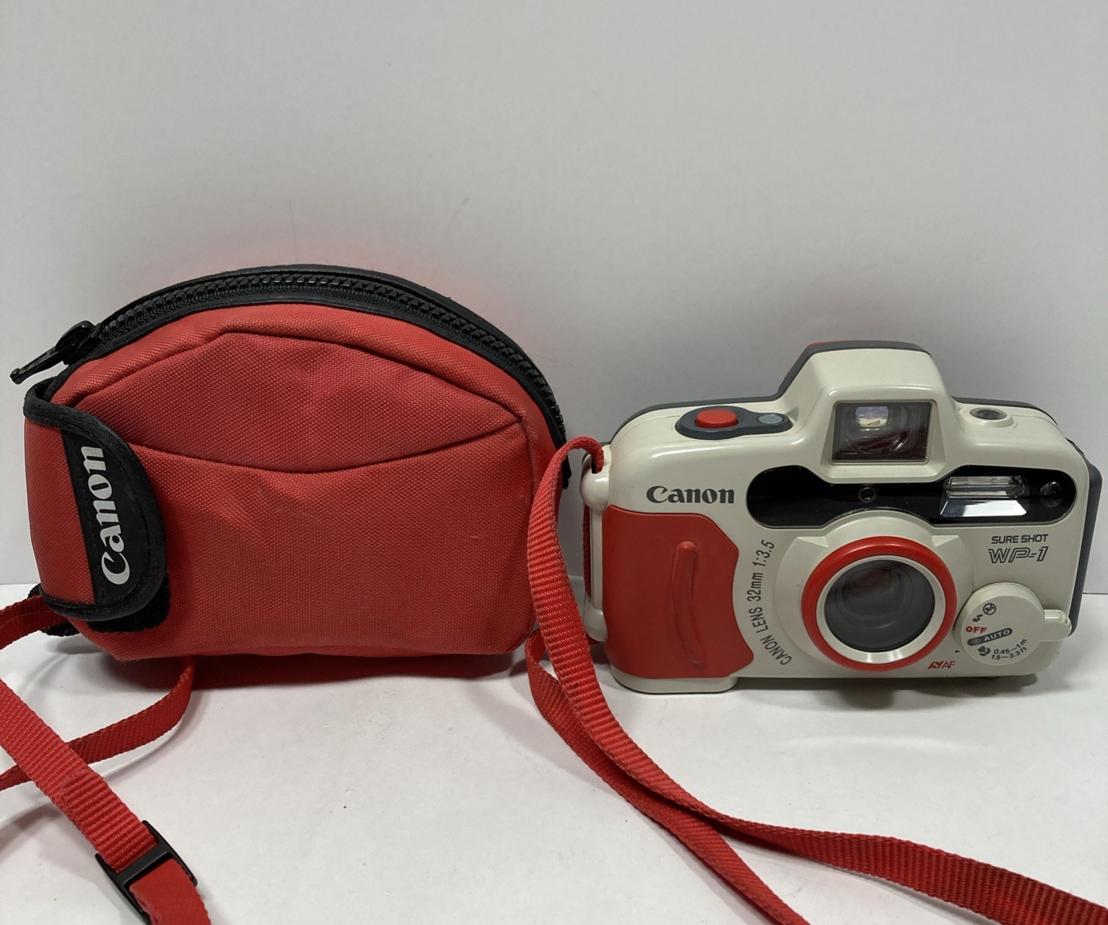 Vintage Canon Sure Shot WP-1 35mm Point & Shoot Film Camera w/ Case & Lanyard