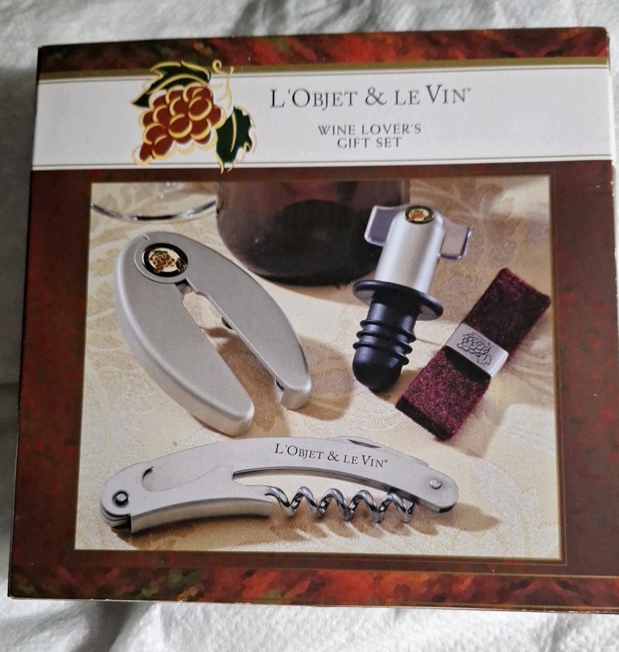Turning Leaf Wine Lover\'s Gift Set. Corkscrew, Foil Cutter, Stopper, Drip Collar Turning Leaf Wine Lover\'s Gift Set. Corkscrew, Foil Cutter, Stopper, Drip Collar