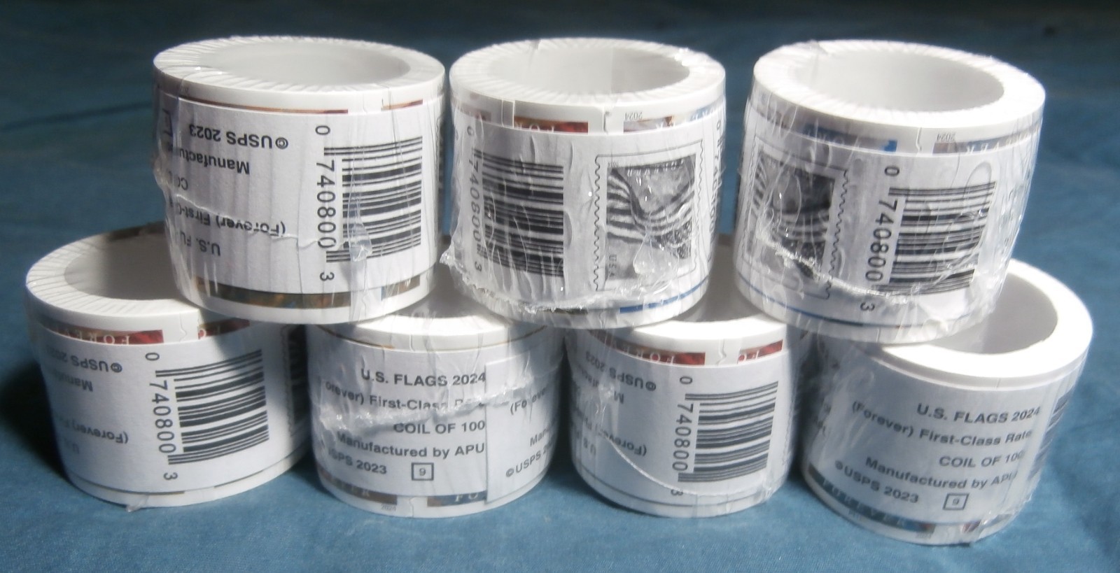 7 rolls of 100 usps stamps total 700 stamps