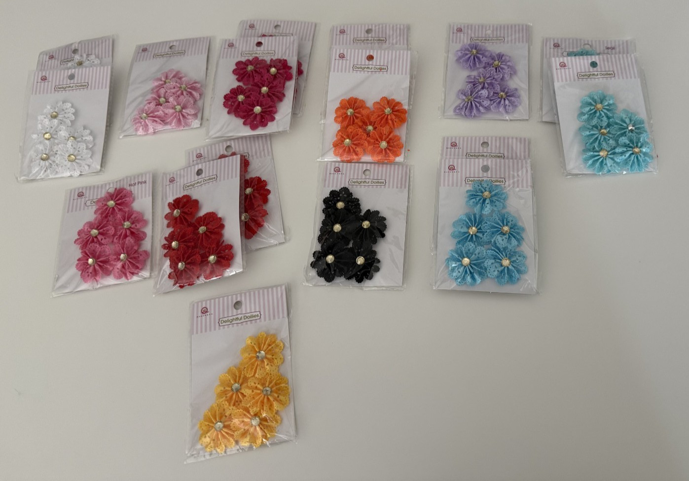 Queen & Co  17 pkgs. Delightful Doilies Flower embellishments - (Lot E)