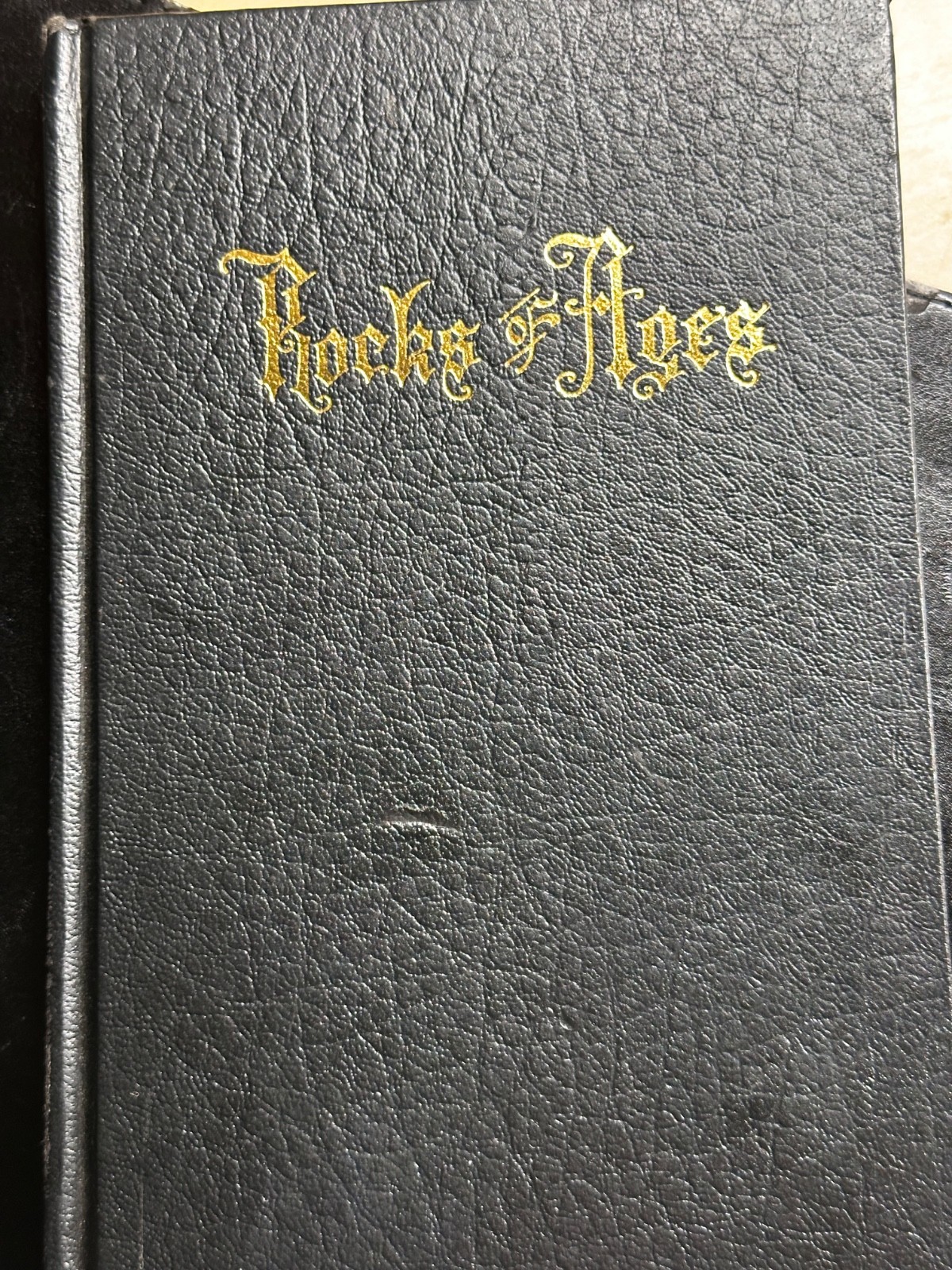 Rock Of Ages by Ed Hardy black book with rock of ages in gold