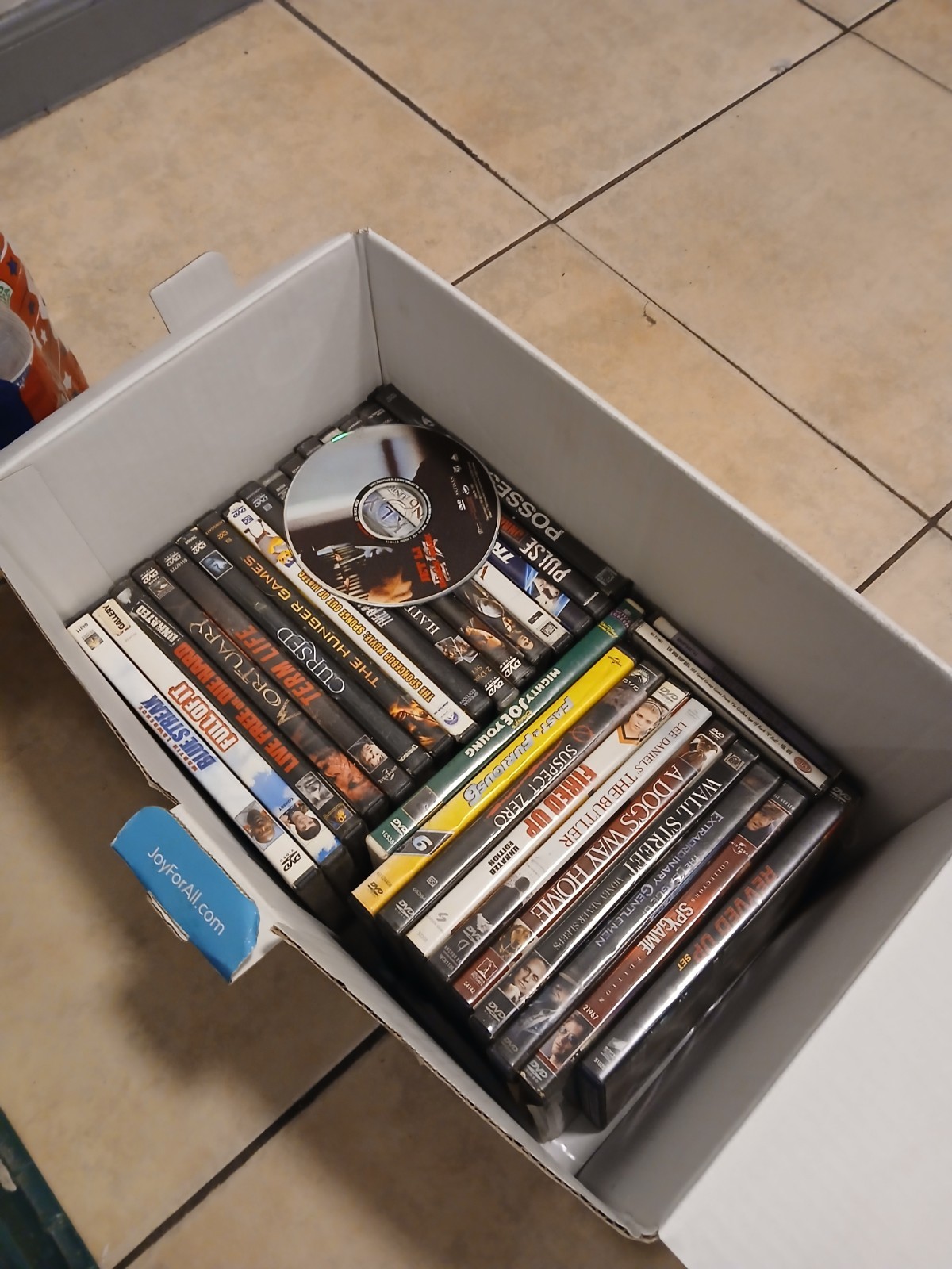 Over 200 DVD Movies For Sell+ A Free DVD Player